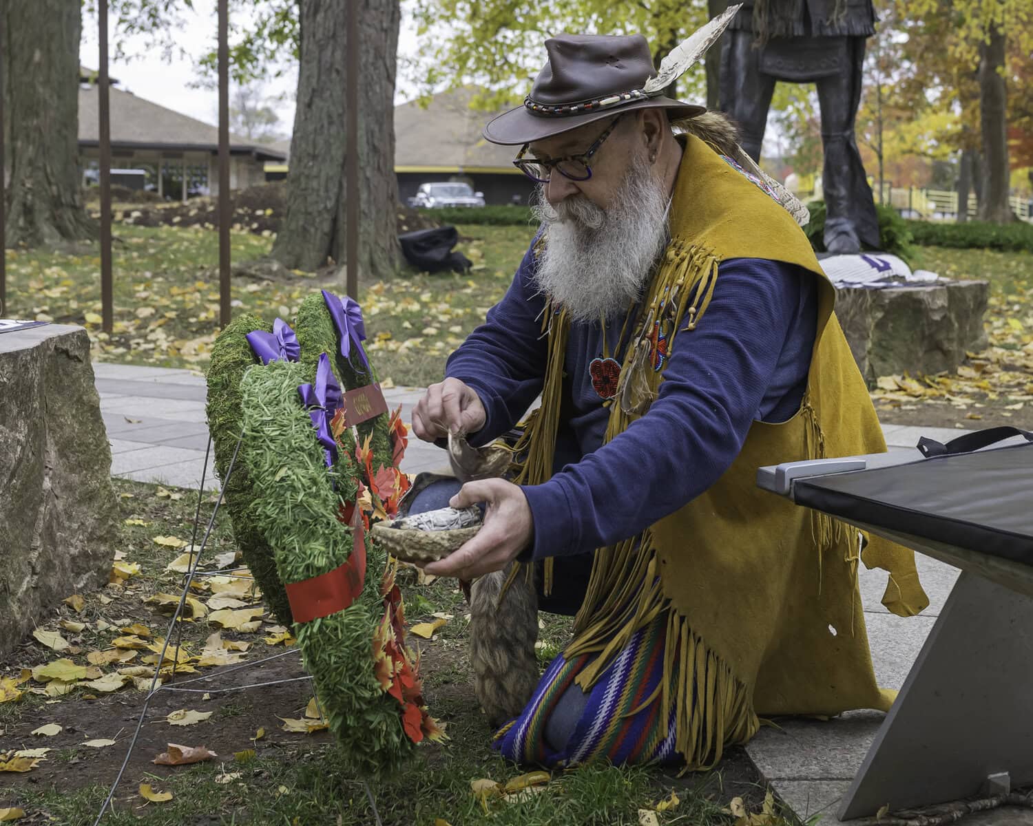 Fire keeper Brian Kon of the Métis Nation, tends the sacred flame through the cold afternoon of the ceremony. “Indigenous people have been among the first to sign up whenever there was a world conflict, to serve and protect the land that was theirs,” says Kon.