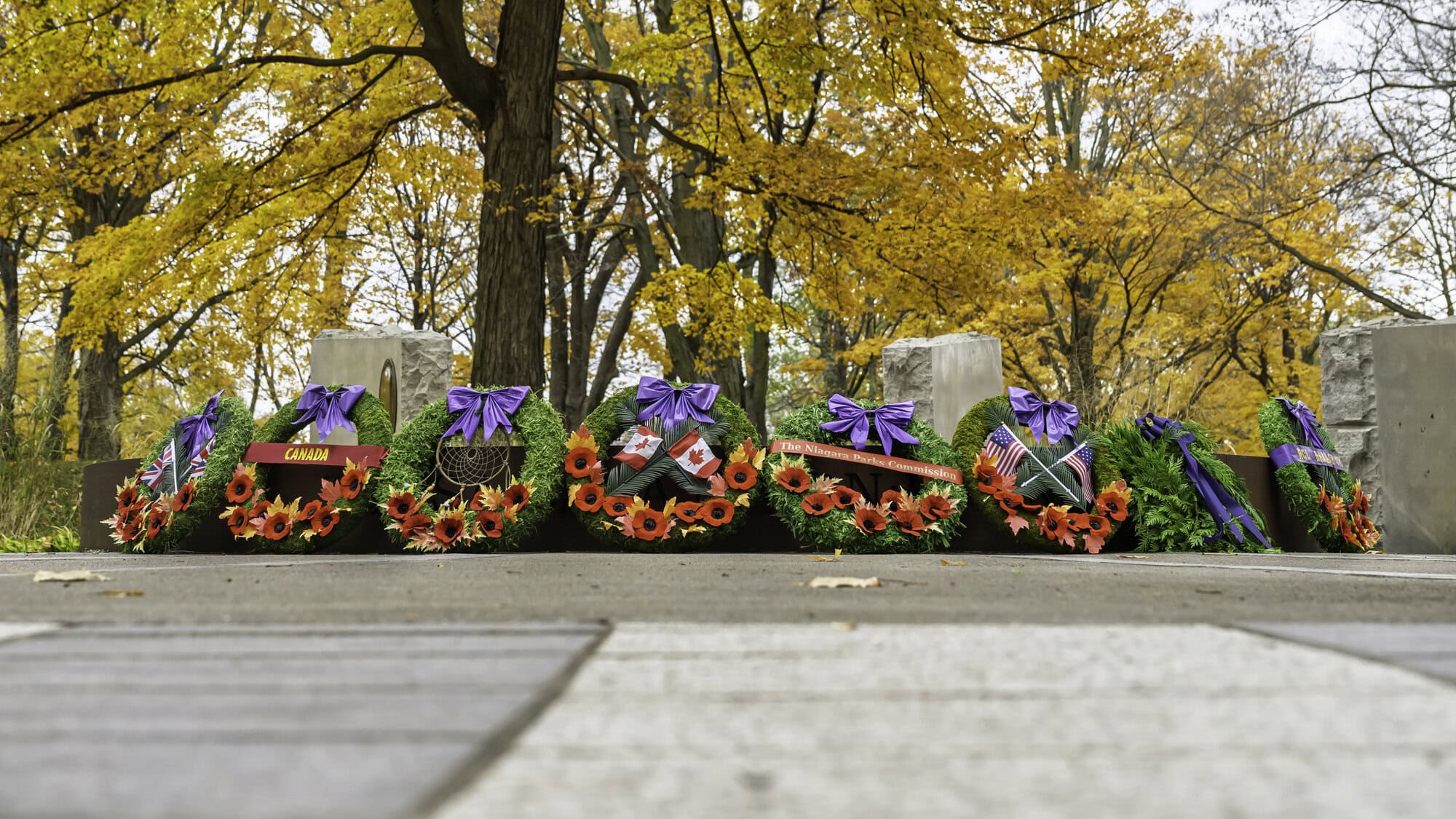 An array of poppy wreaths were laid the Landscape of Nations Commemorative Memorial, in honour of the Indigenous veterans who fought for and alongside Canada over the past few centuries.