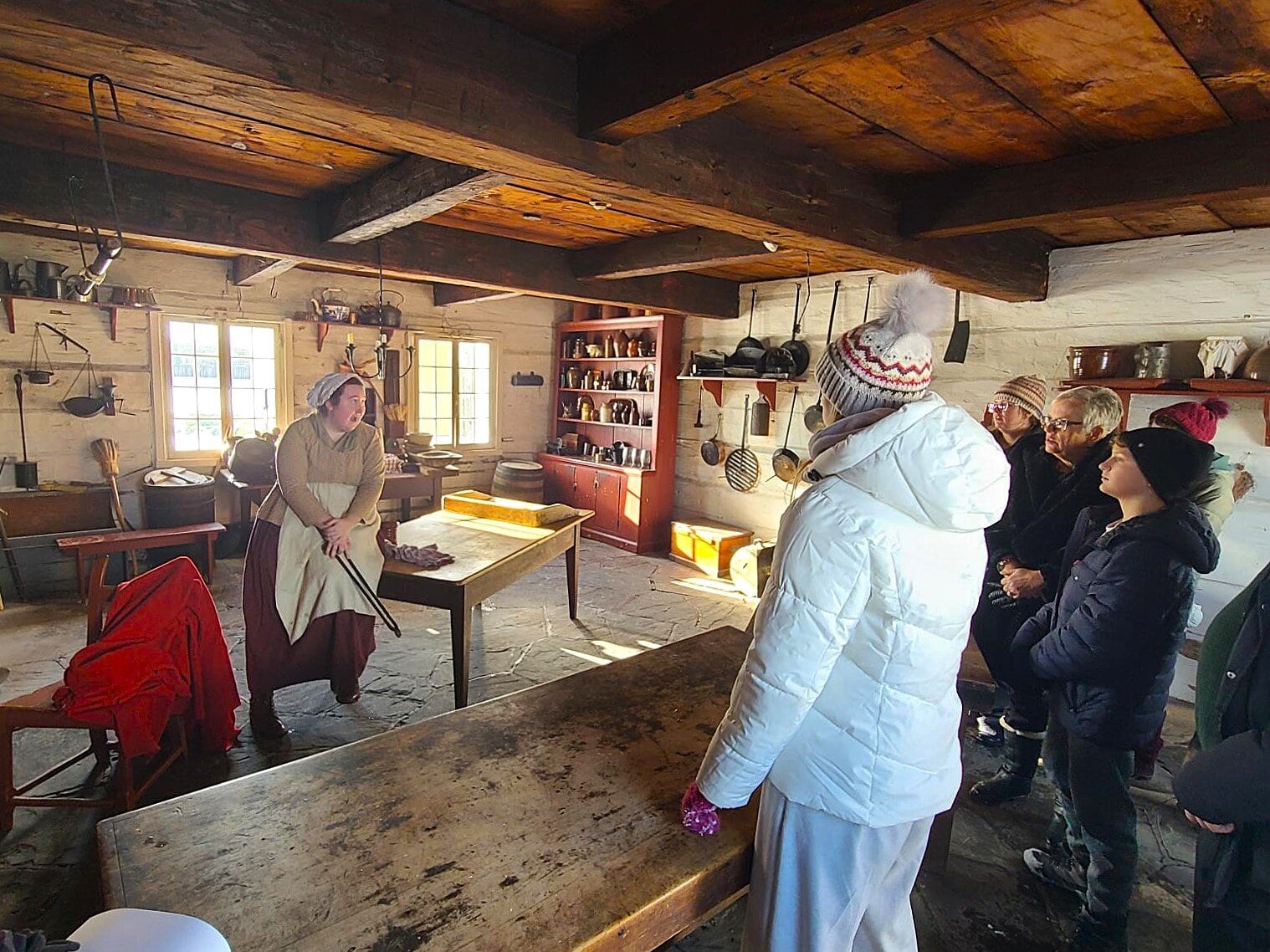 Historical cook Madison Hobbins demonstrates period baking in the officers kitchen, letting visitors get a taste of what holiday treats people were eating 200 years ago. 