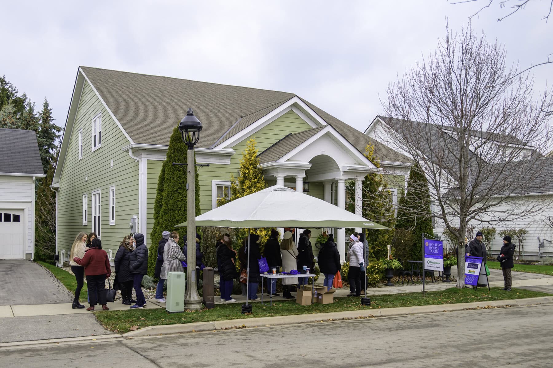 The Holiday House Tour draws hundreds of visitors to its featured homes, who wait patiently outside for their opportunity to head inside and check out the homes, like this one at 54 Brock St.