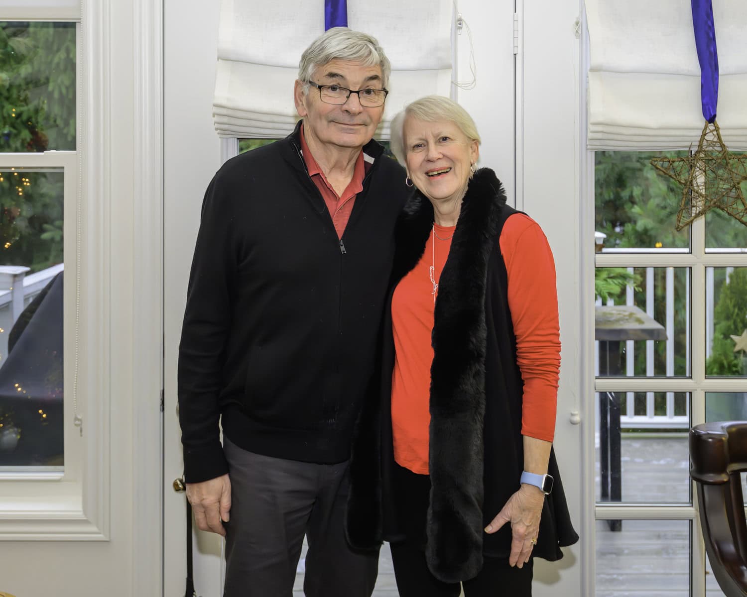 Homeowners Mark and Heidi Brown greet guests to their home, the Cottage, on Brock Street, with holiday cheer. "We have had a lot of fun doing it," said Mark Brown.
