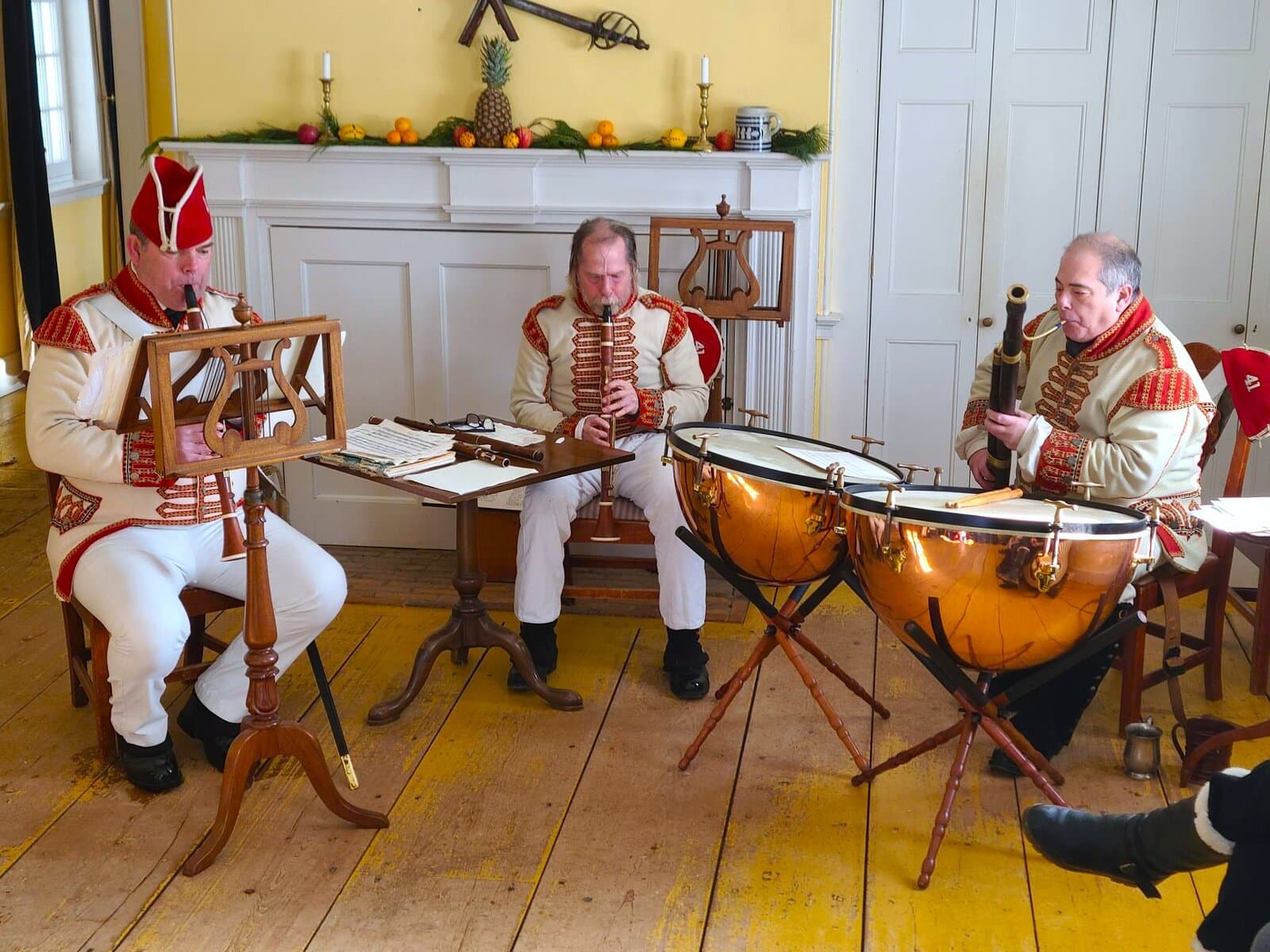 The 41st Regiment Band of Music perform Duke of York’s Troupe, a British Army standard first published in 1763. From left are Gavin Watt, Peter Mitchell and Peter Alexander, playing period instruments researched for authenticity. 