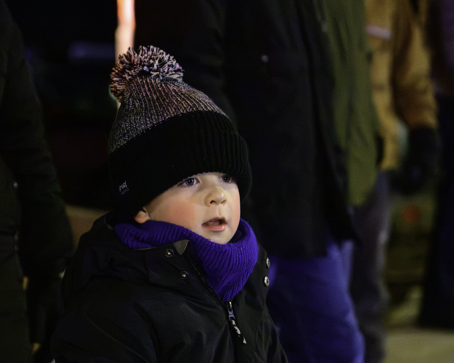Four-year-old Beau Fisher is all starry-eyed at the sight of the illuminated tractors.