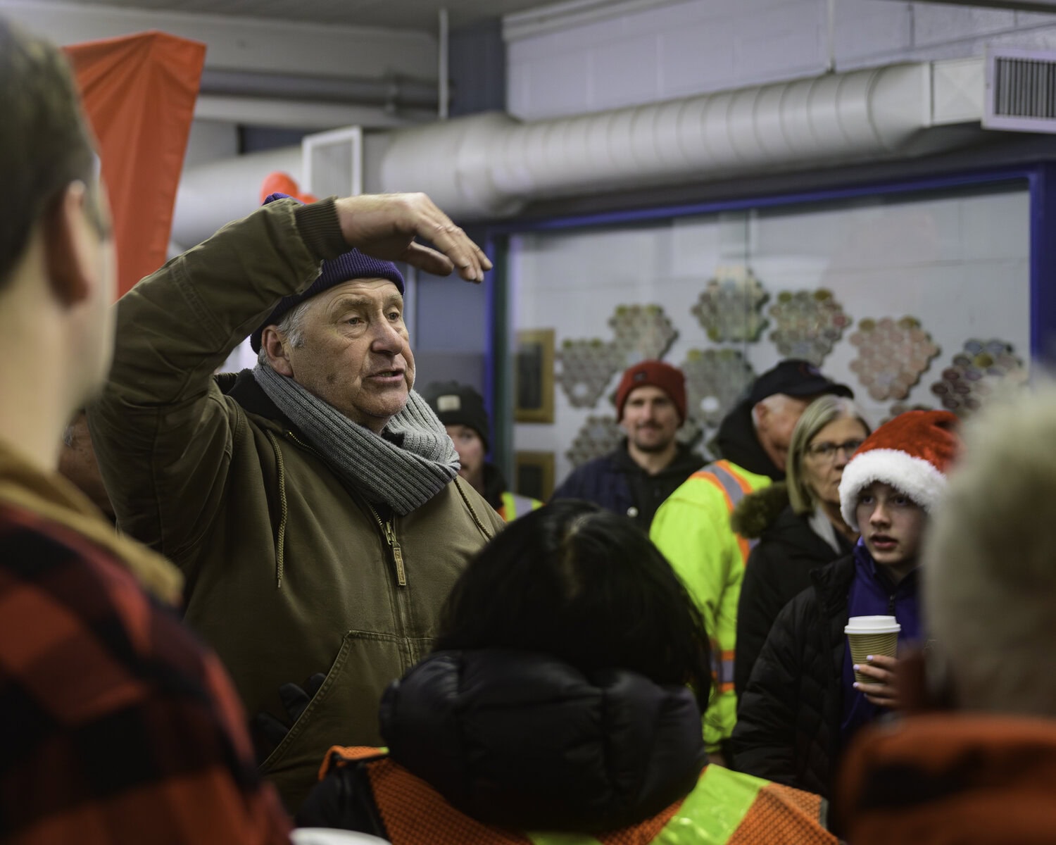 Coun. Erwin Wiens, co-organizer of the parade, gives some last-minute instructions to the volunteers to make sure things go off without a hitch.