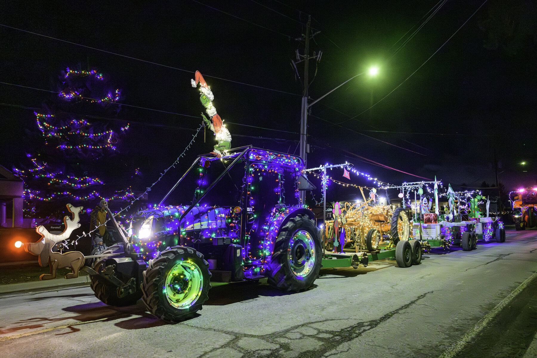 Another one of Virgil's participants in the parade, Mr. Anti-Christmas himself, the Grinch, driving his tractor-sled.