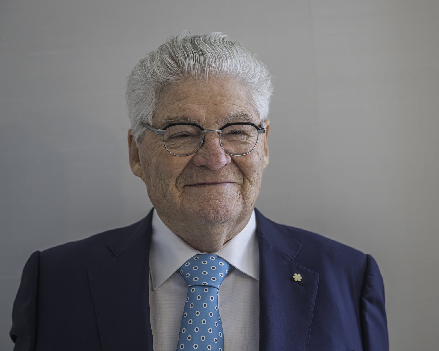 Donald Triggs proudly wears his officer of the Order of Canada pin.