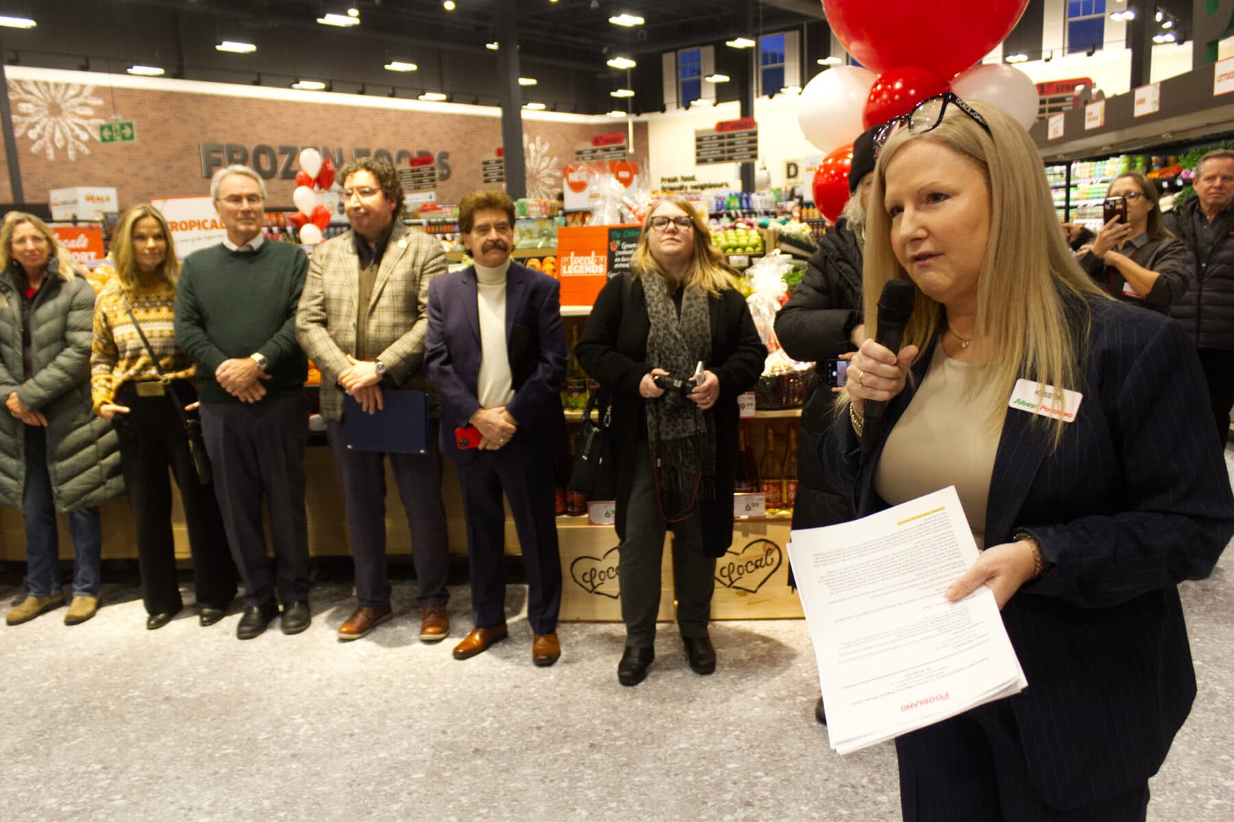 Krista Payne, vice president of operations at Sobeys, addresses a crowd that included politicans at multiple levels of government during the opening of Garrison Village's Foodland store on Thursday.