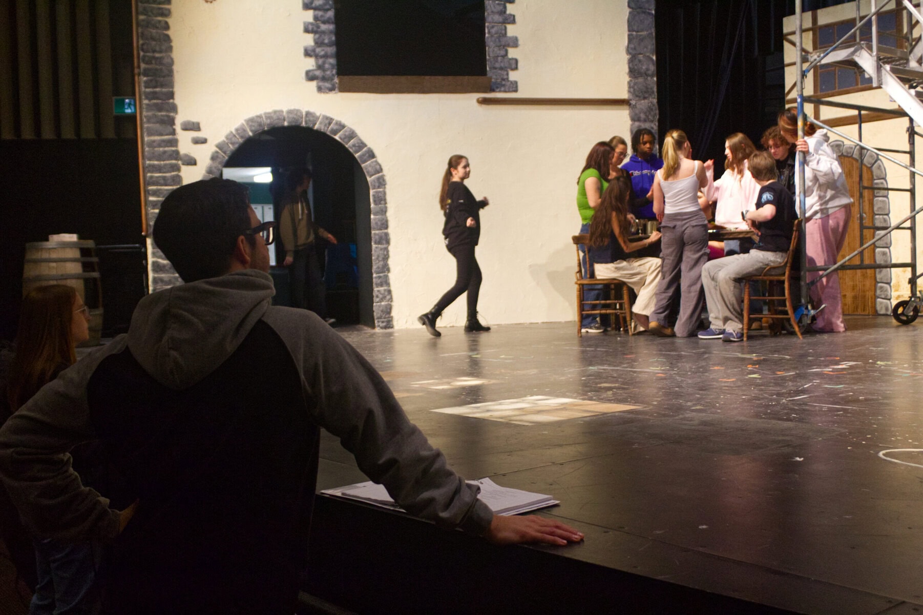 Laura Secord Secondary School drama teacher and play director Chris Baker overlooks his students' performance during their dress rehearsal last Tuesday for "Les Miserables."