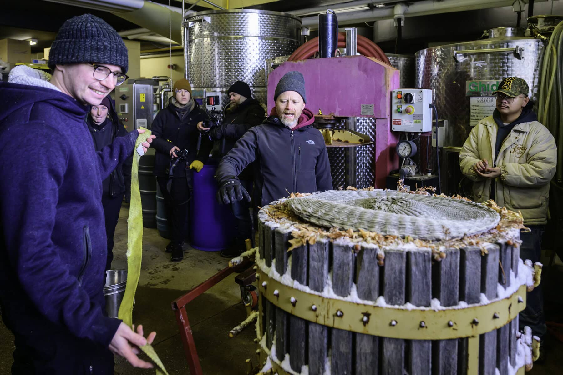 In the centre, professor Gavin Robertson explains how to prepare the barrel for the pressing of the grapes. After the pressing comes the fermentation process, followed by aging.