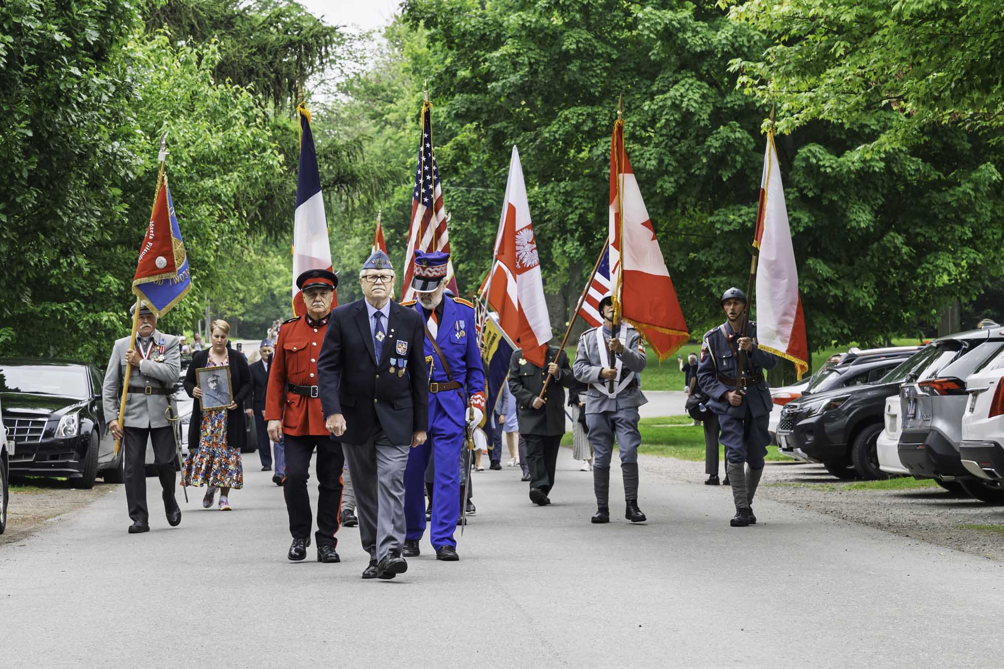Members of the Polish community gather to remember 26 soldiers who died of influenza at Camp Kościuszko in NOTL more than 100 years ago.