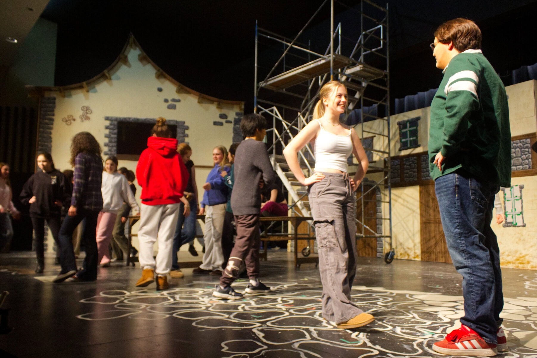 Sarah Arsenault and Als Vanderlee engage with each other during their dress rehearsal last Tuesday for "Les Miserables." They and other students will be performing the play in late February. 