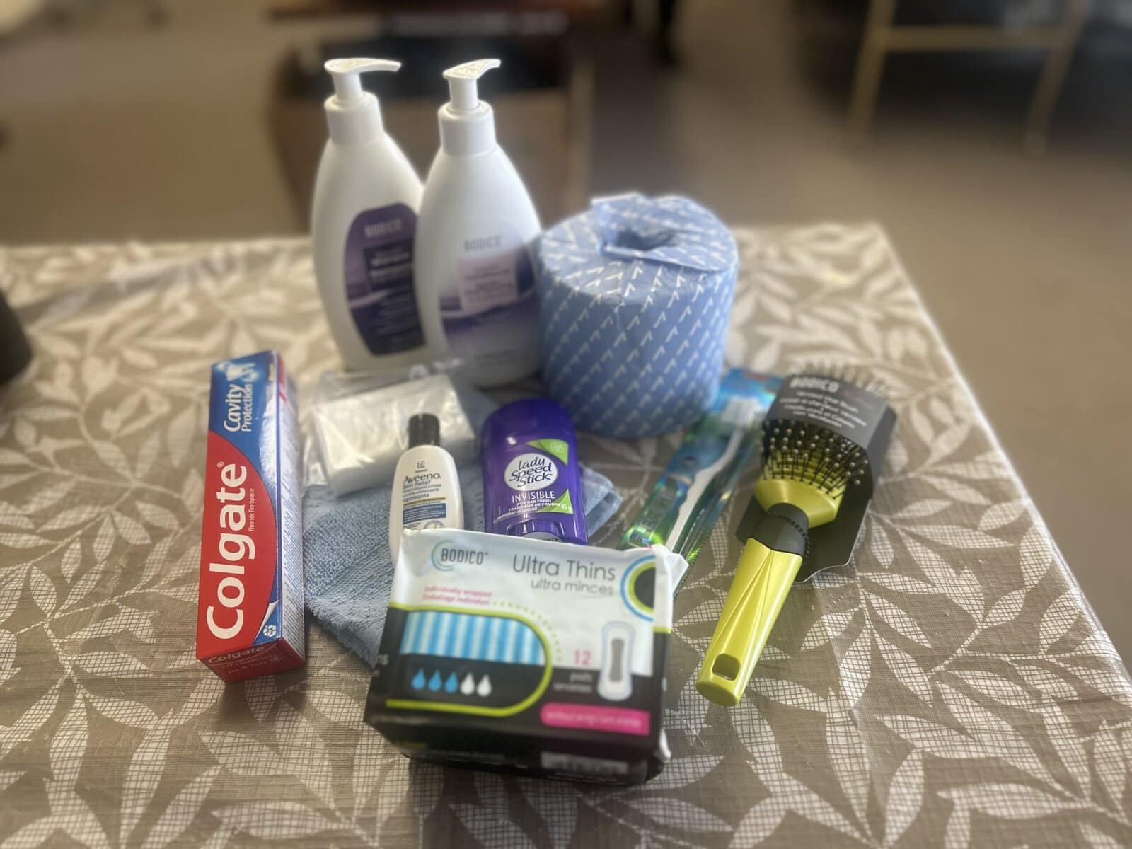 Hygiene essentials donated to the Farmworker Hub NOTL are laid out in a photo from last year before being packed into wellness bags for migrant farm workers returning to Niagara-on-the-Lake. This year, the need for those items is even greater following the devastating impacts of Hurricane Melissa.