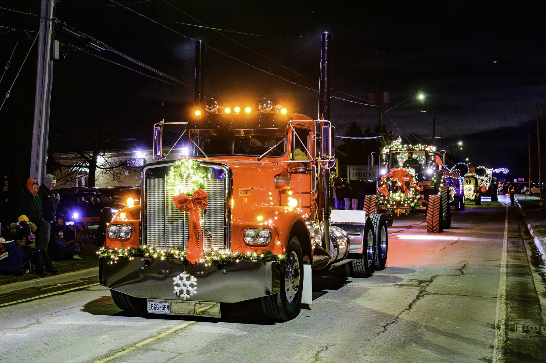 Santa comes to town for the annual Christmas Parade through Old Town and the fifth annual Tractor Parade lights up Virgil as 92 elaborately decorated trucks and tractors roll through the streets.