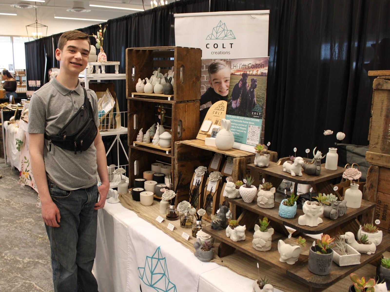 Colt Hill, 13, of Welland displays concrete and jesmonite home décor at his Colt Creations table; Hill said he chose to start a business rather than wait for a summer job. 