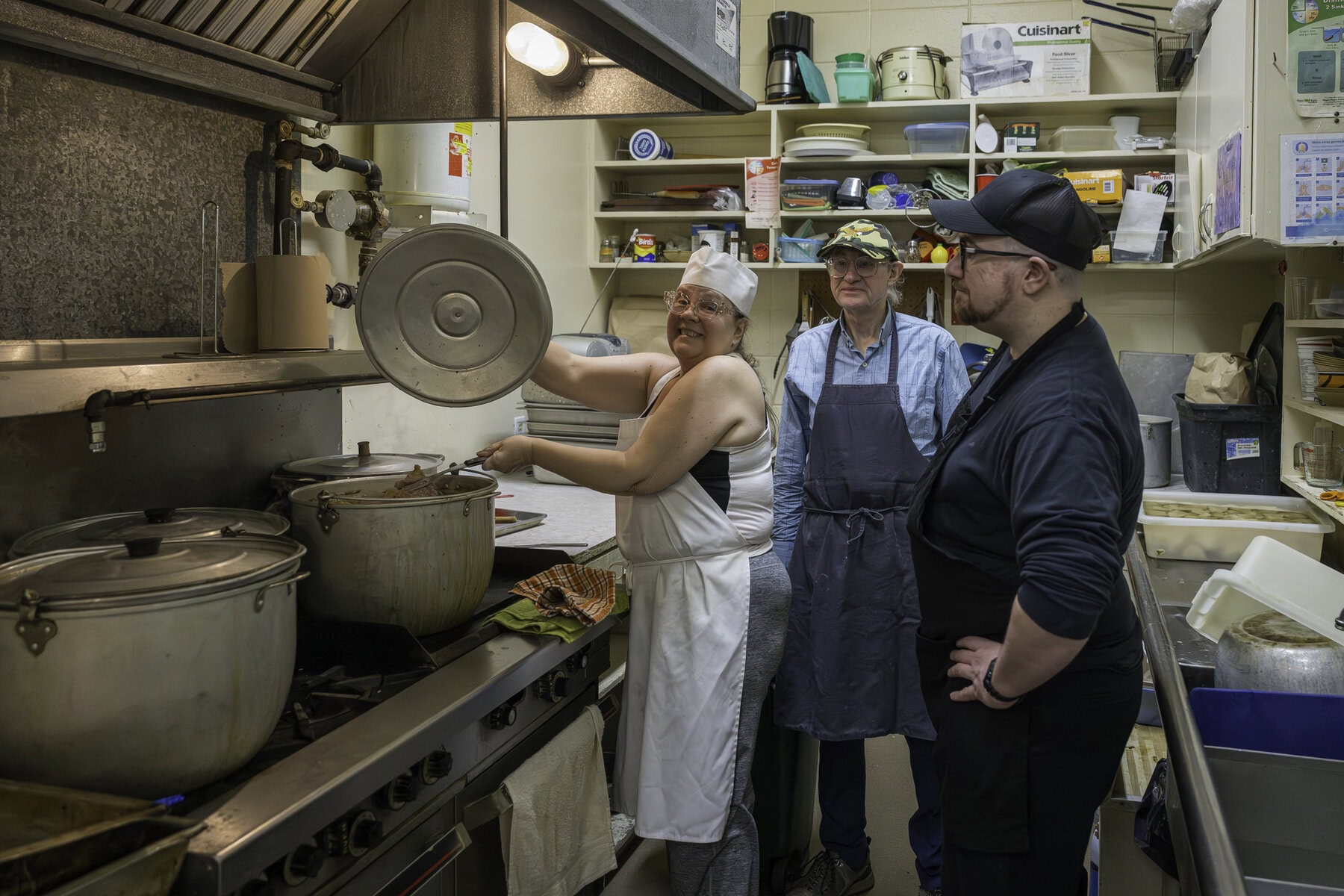 Over at the NOTL Legion Brach 124, Chrystal Haverstock, Paul Doby and Simon Vaughan cook up some corn beef and cabbage and rice pudding for the attendees.