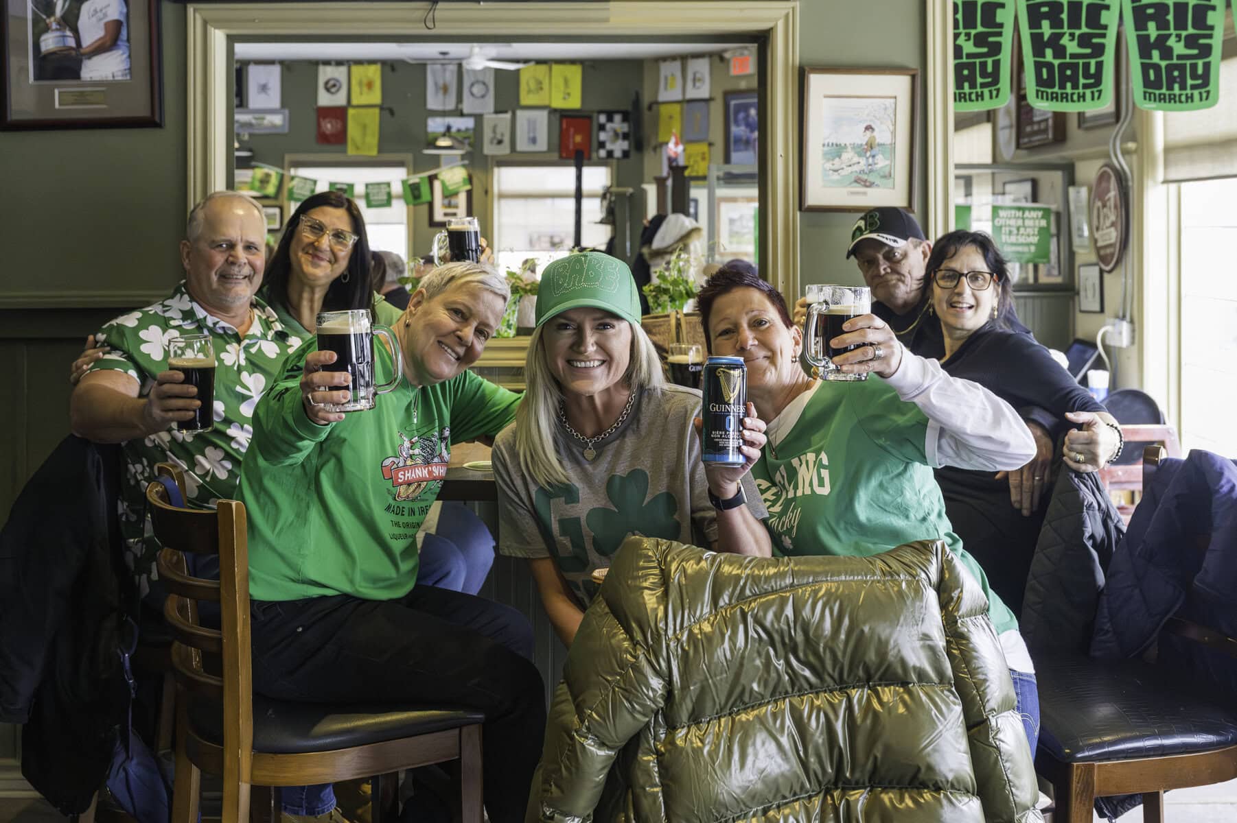 Top: Friends and family celebrate St. Patrick’s Day with a toast at the Sandtrap. Taking
part in the festivities are (from left) Dave Morris, Mary Delvecchio, Anna Peters, Jen
Green, Tracey Peters, Randy Duff and Rita Delvecchio.