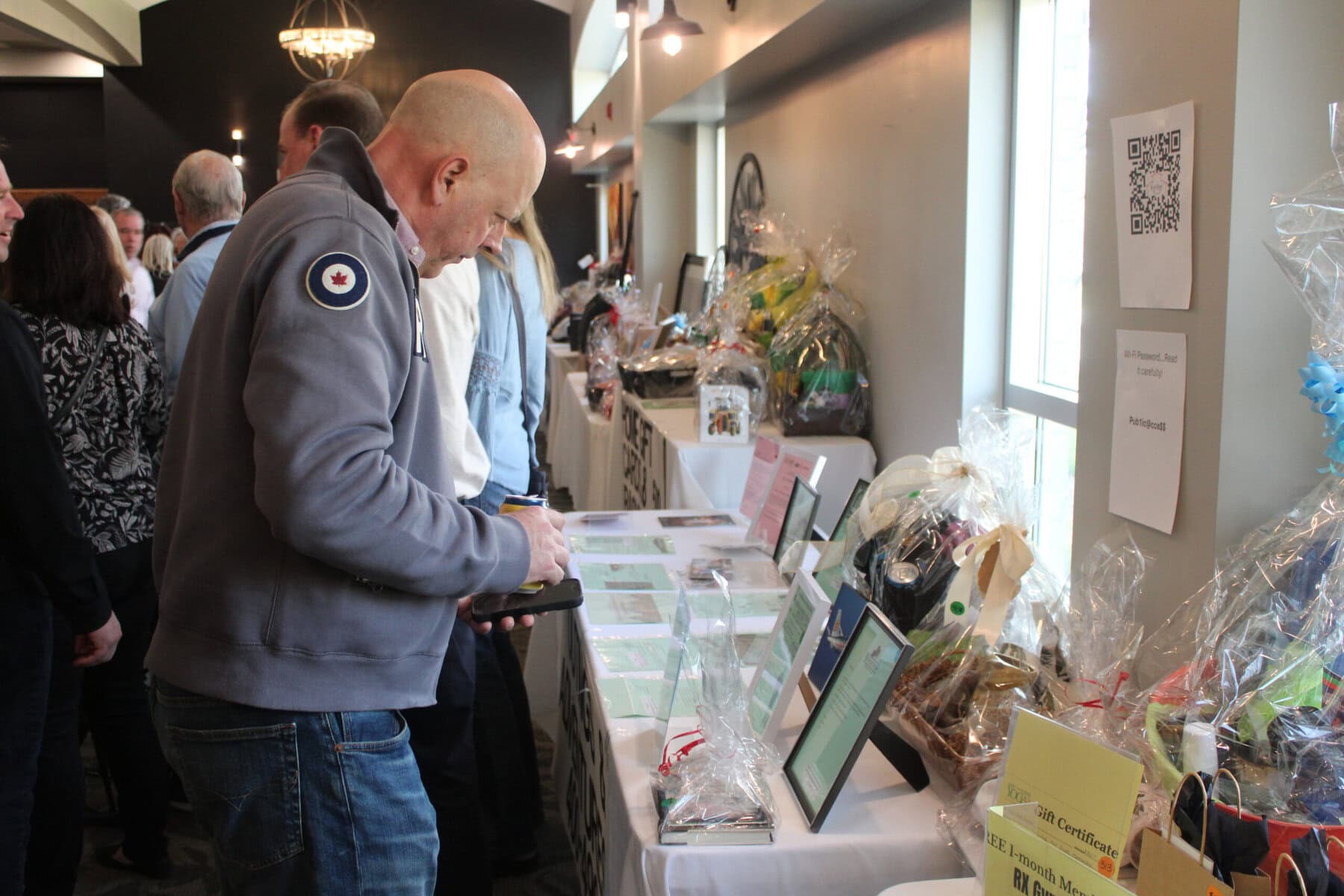 Guests lined up to buy $20 raffle tickets during Red Roof Retreat’s annual Pasta Dinner at Club Roma in St. Catharines.