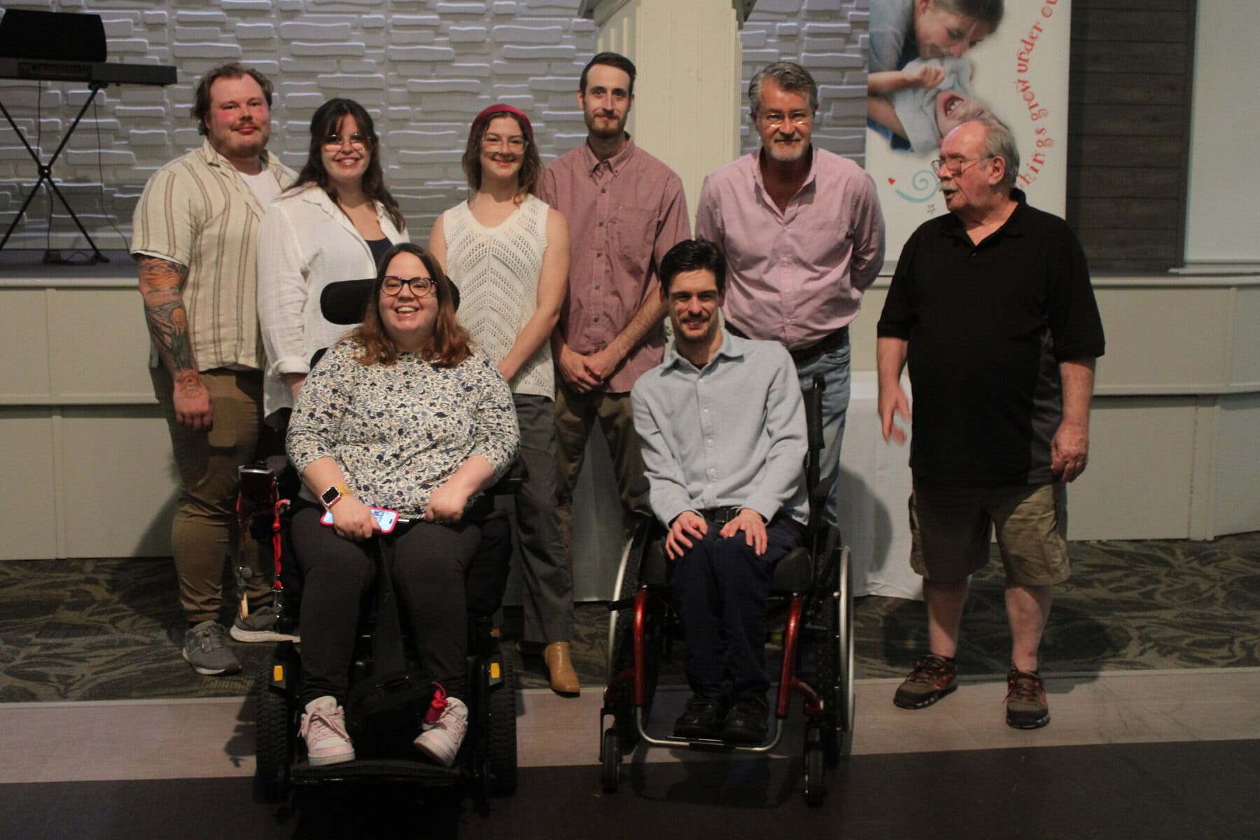 Members of Table 43, recognized as the top table-bidding group of the night with $6,540, are (top) Jessee Desmit, Sarah Desmit, Morgan Heyde, Robert Burciul, Paul Goodman, Ted Wilson, (bottom) Ashiee Dagenais and Calvin Goodman.