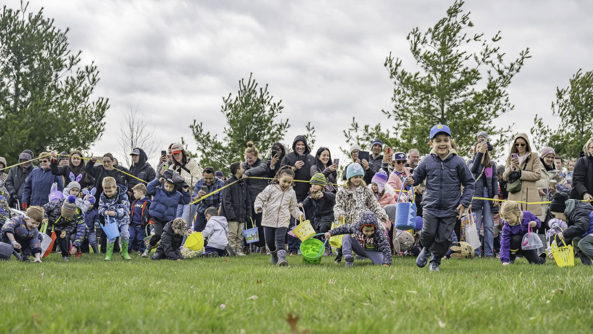 And they're off: hundreds of kids take off from the starting line in a mad dash to collect as many Easter eggs as they can at the Kinsmen Club's Easter Egg Hunt.