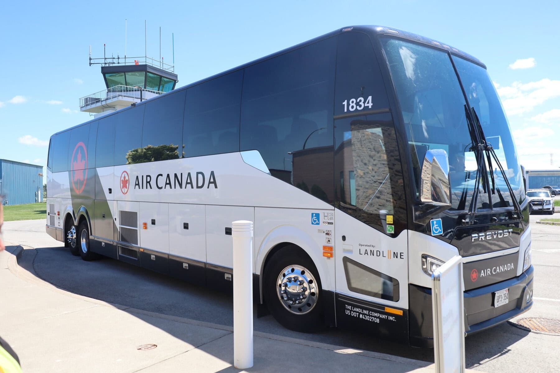 An Air Canada Landline bus pulls up to Niagara District Airport on Monday, picking up Niagara travellers booked on Air Canada flights for the first time under the new Pearson connection.