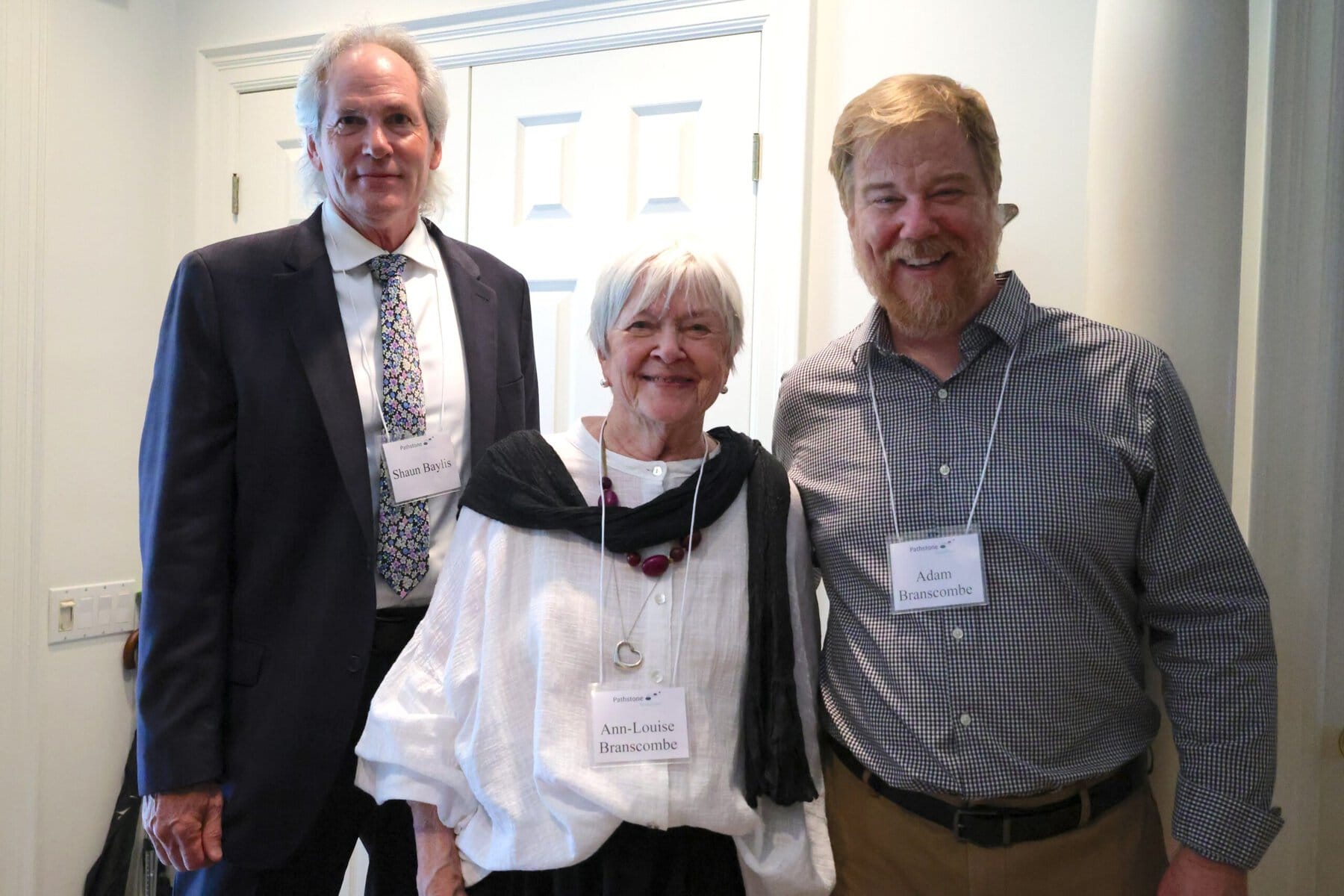 Pathstone CEO Shaun Baylis, philanthropist Ann-Louise Branscombe and her son Adam at the reception in NOTL last week. 