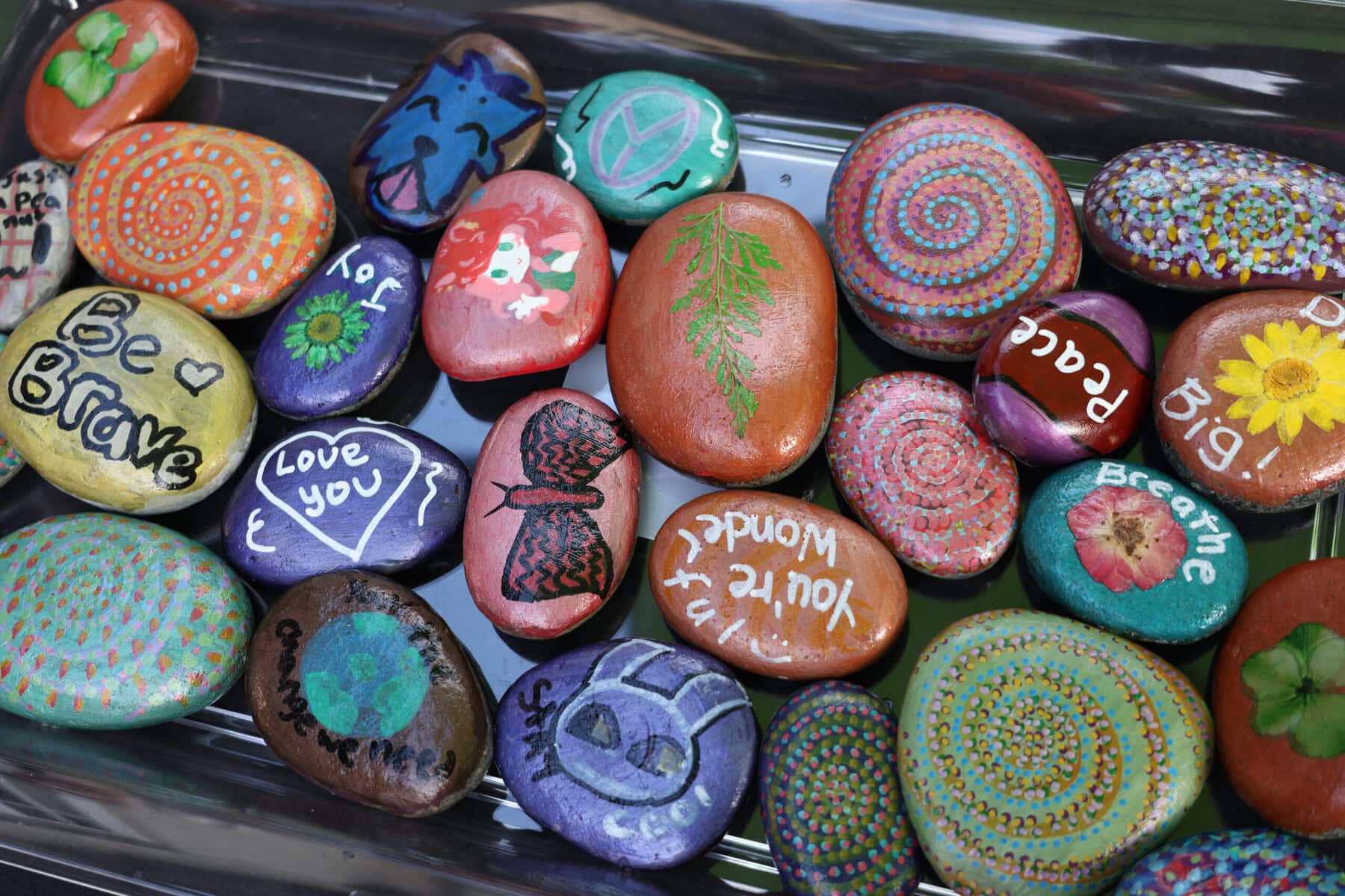 Hand-painted stones with positive messages were created by clients of Pathstone and given to those who attended the kick-off in NOTL last week. 