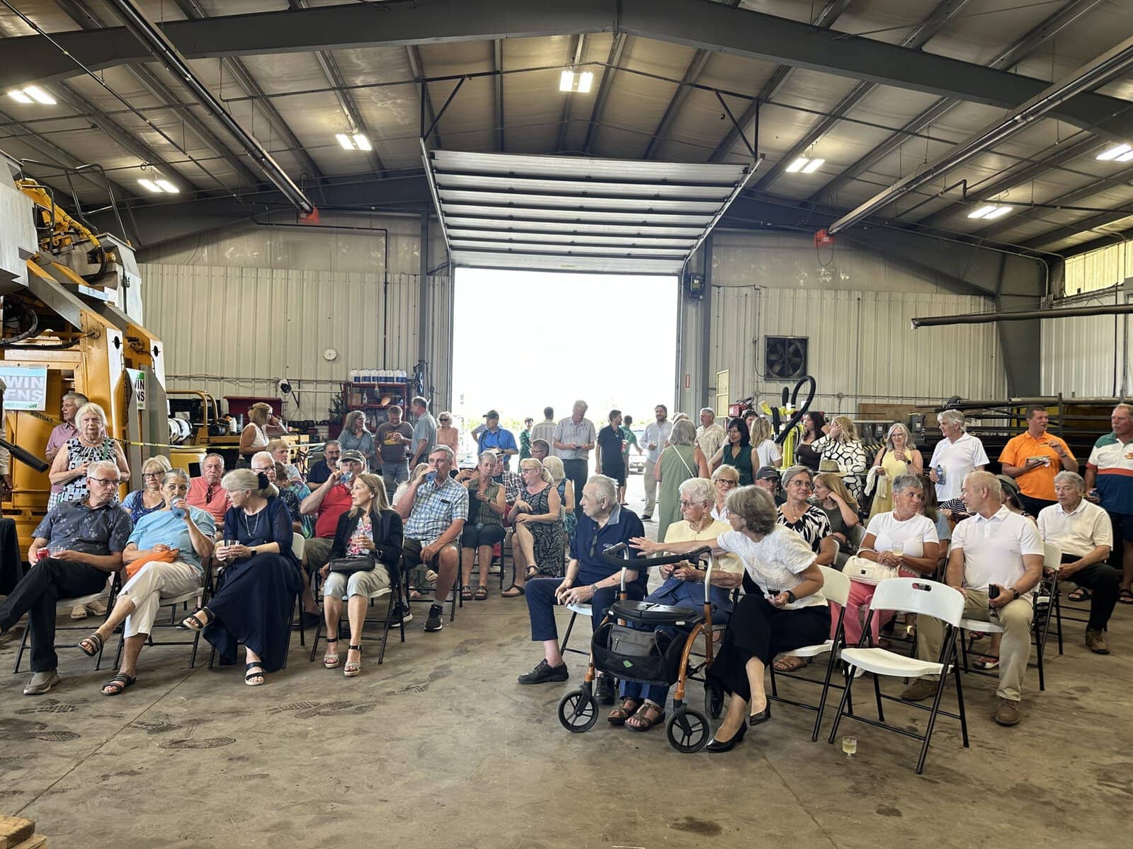A crowd of supporters gathers inside Lakeview Vineyard Equipment Inc. on Monday evening as Deputy Lord Mayor Erwin Wiens launches his campaign for lord mayor of Niagara-on-the-Lake.