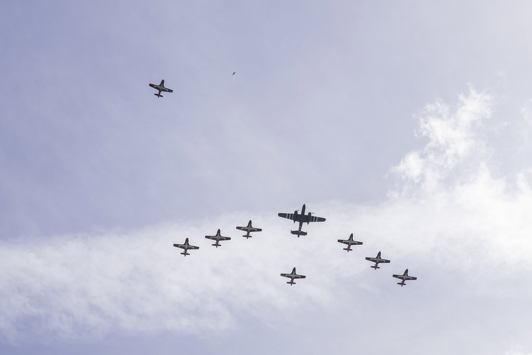 Nine jets, flying in perfect formation. They were joined by a historic B-25 Mitchell, an American medium bomber dating back to 1941.