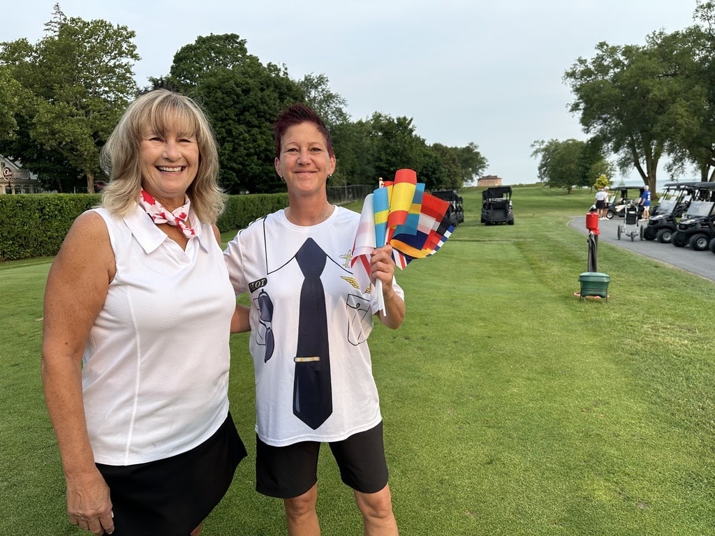 Cathy Taylor and Tracey Peters get ready for the Invitational.