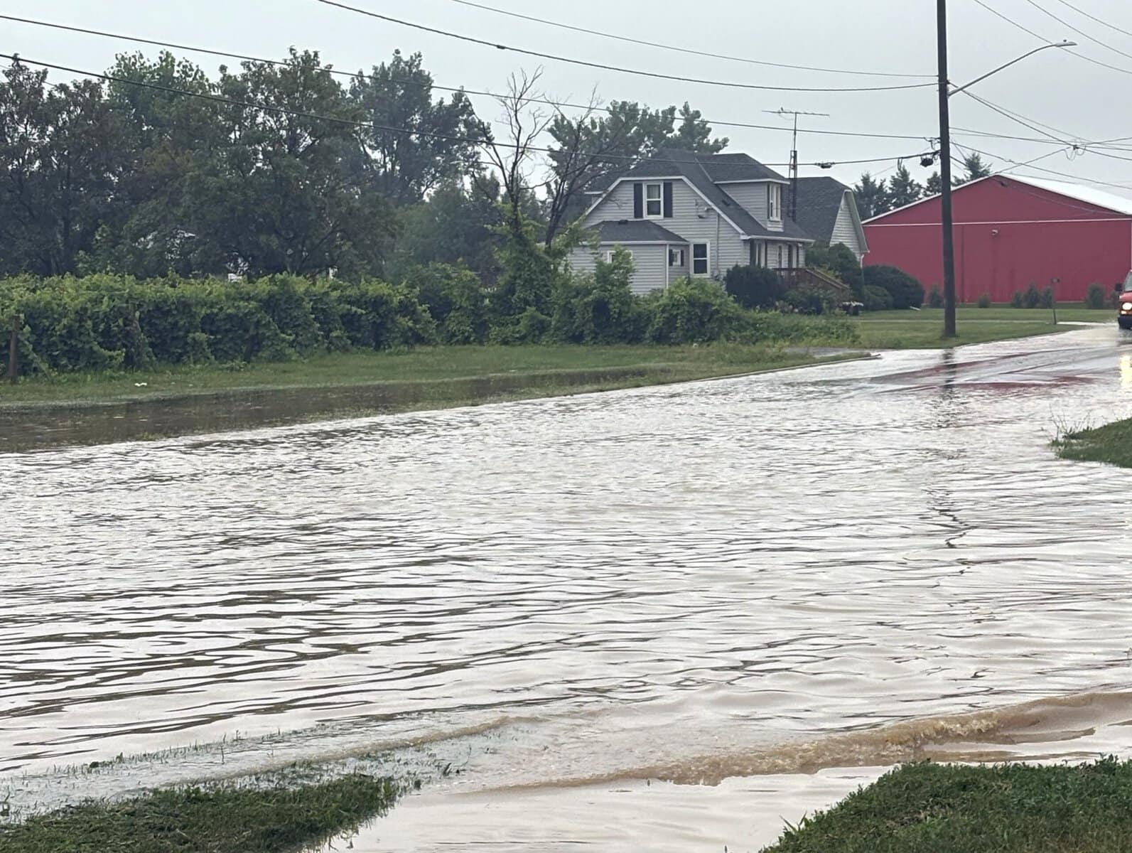 Deep flooding on Concession 4 Road between Line 1 and 2 roads.