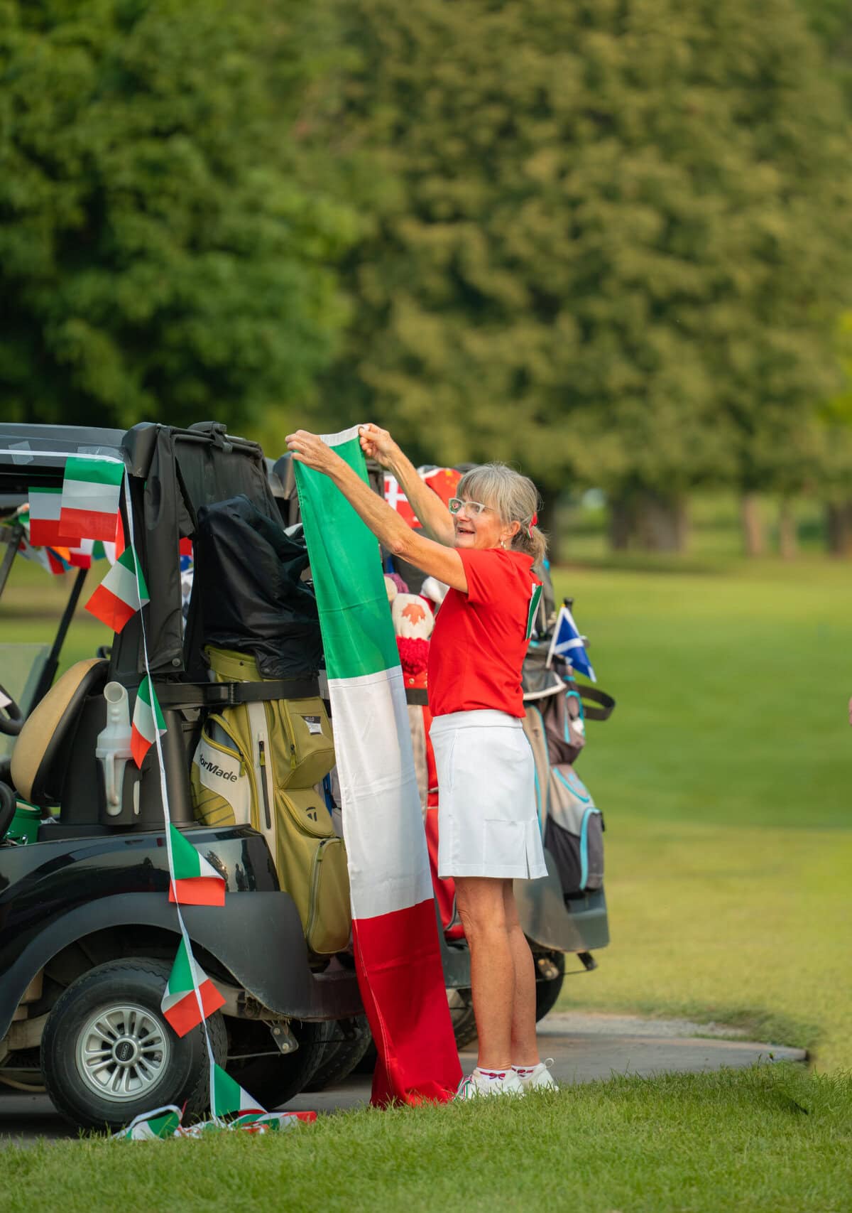 Maria Townley decorates her cart with a decidedly Italian theme.