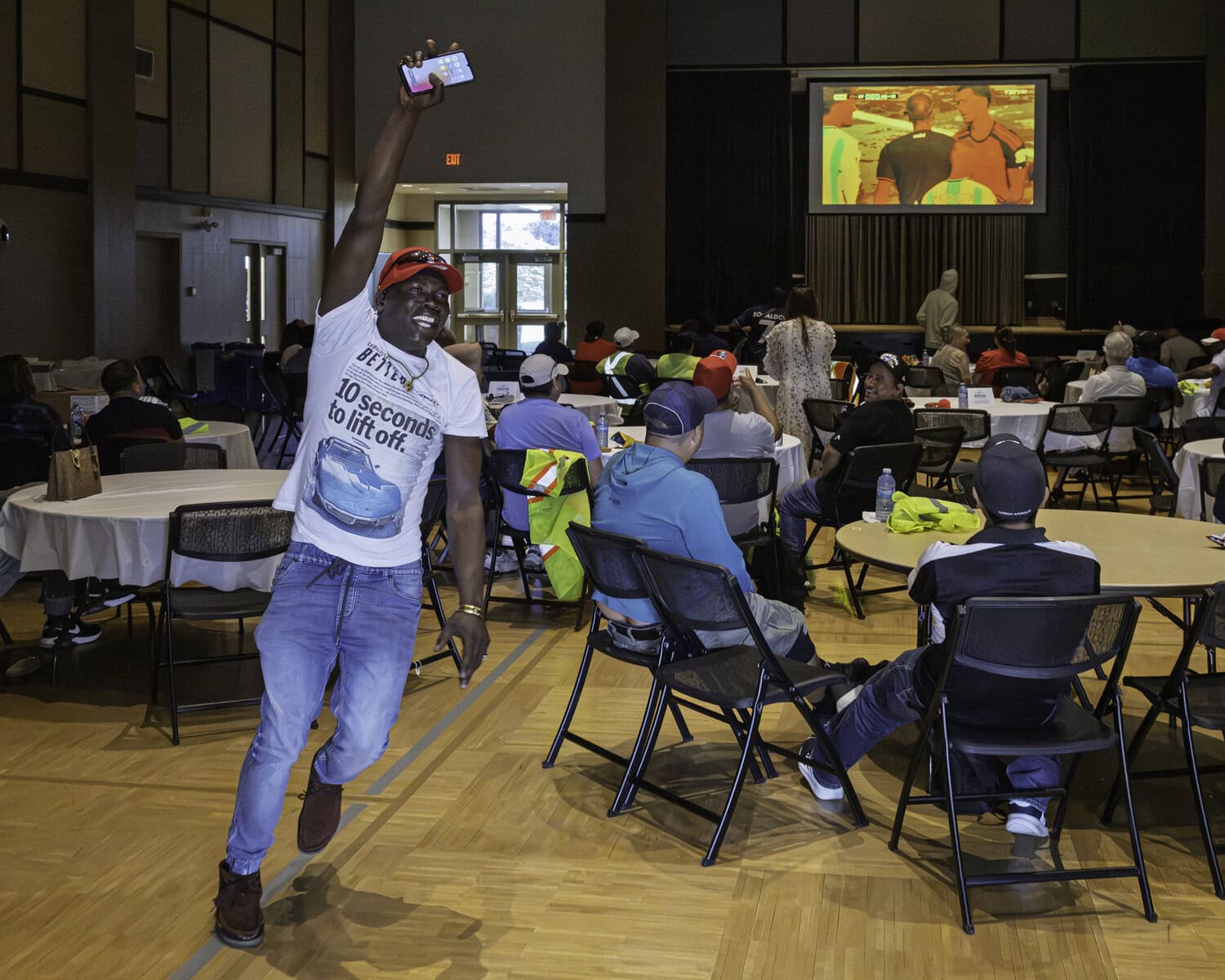  After 96 minutes of intense play, Spain gets the ball in the back of Argentina’s net during the FIFA World Cup final on Sunday,
July 19. Melvin Bonnick celebrates at a watch party at the Niagara-on-the-Lake Community Centre. The goal was disallowed due to a foul, but 10 minutes later, Spain scored again, clinching the match.