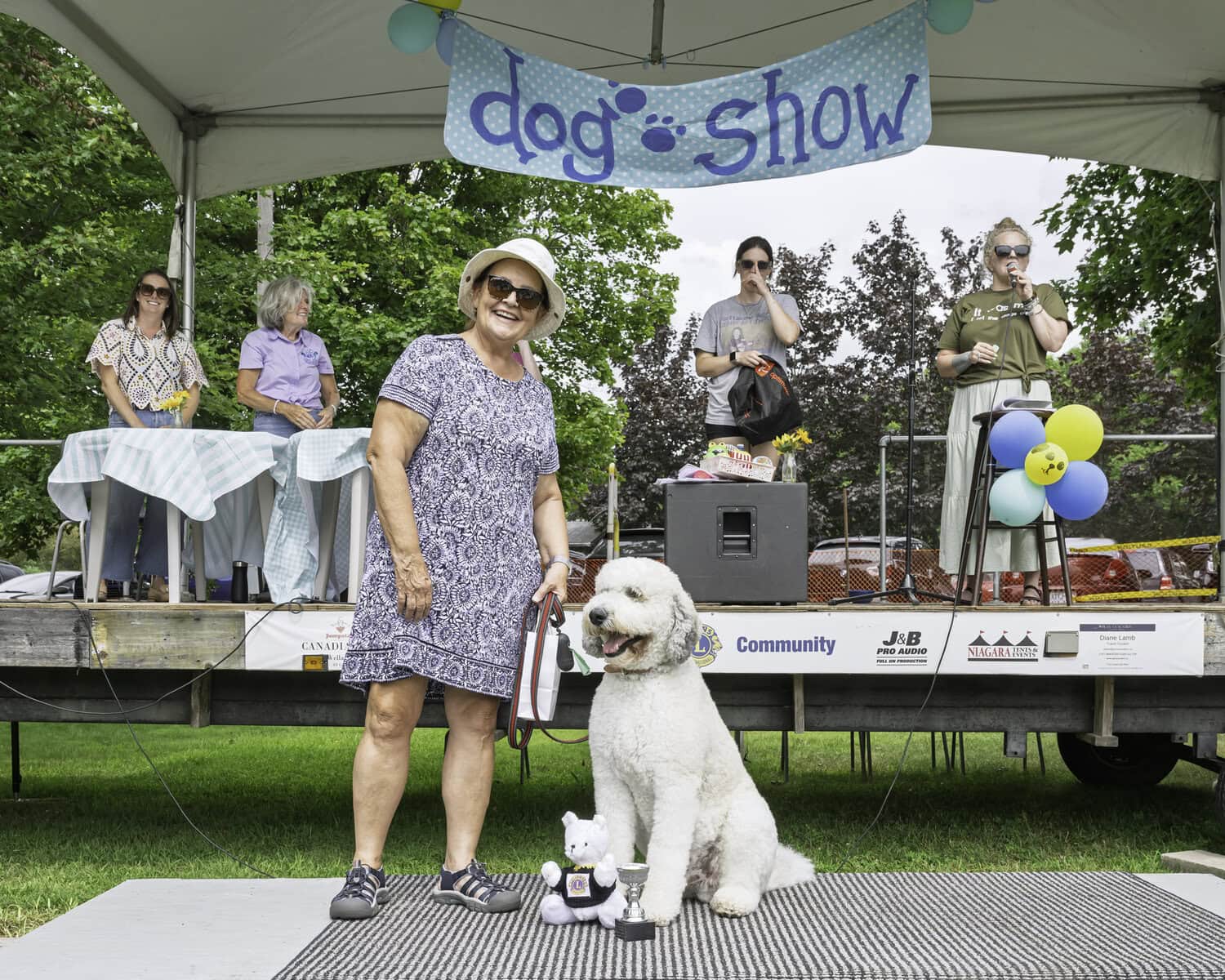 Sherry St. Denis and her dog, the four-year-old Whoodle names Bernie, clinched the top prize at the dog show: best in show.