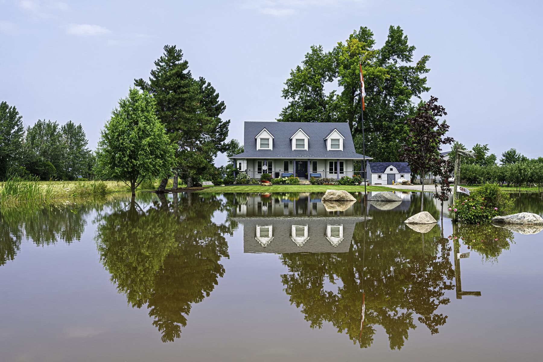 It'll be difficult to access this charming cottage on 102 Line 1 Rd., thanks to flooding in its front yard.
