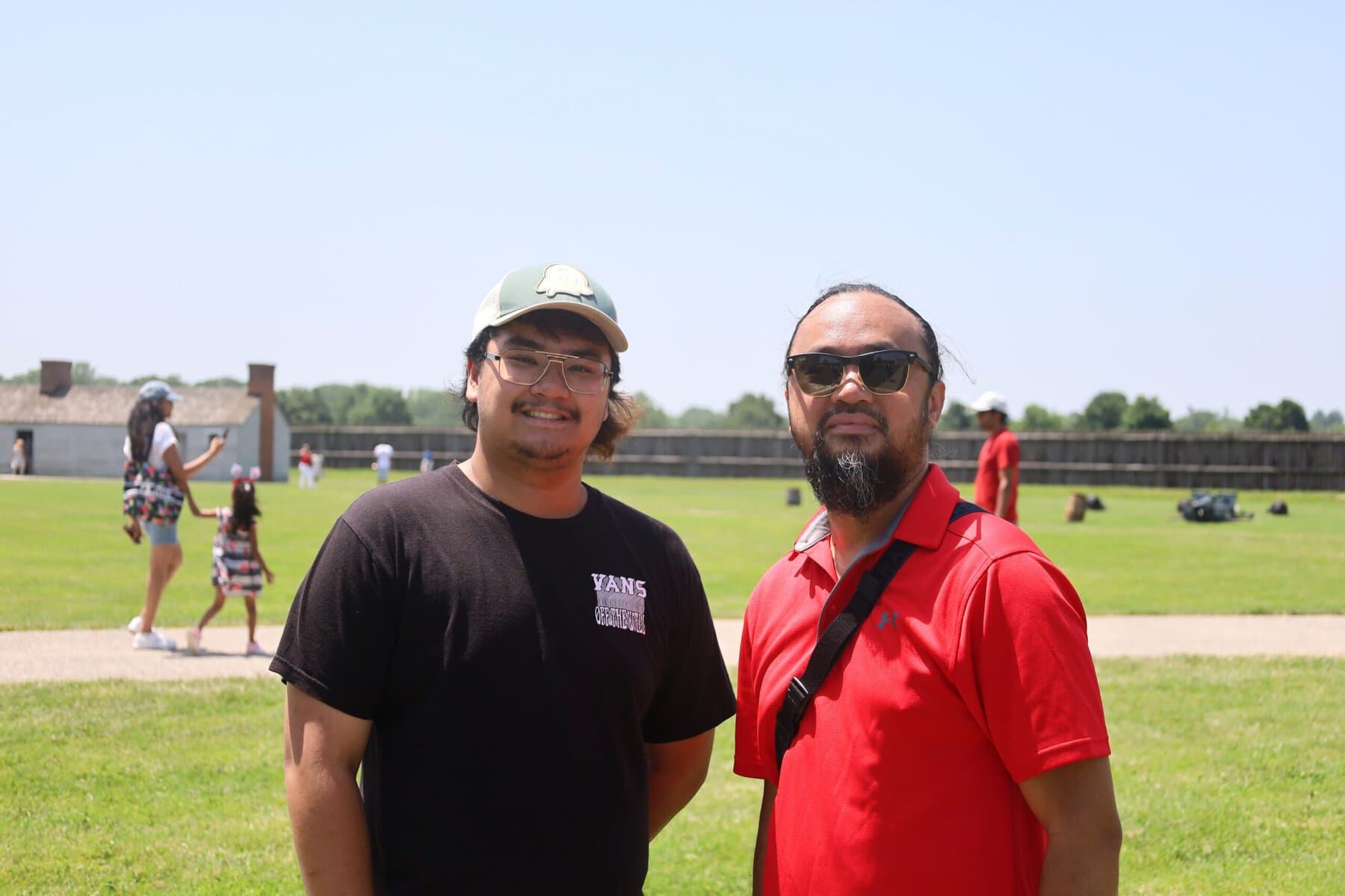 Virginia visitors Nigel Coquilla, left, and his father, Mike, stumbled into Canada Day at Fort George after spotting Niagara-on-the-Lake on a map during their trip to Niagara Falls.