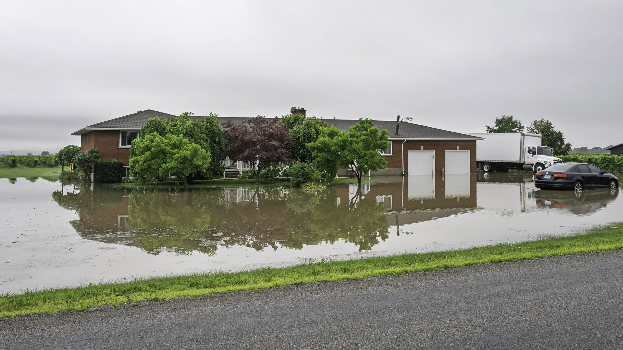 Another property in the farmlands, this one at 917 Line 2 Rd., surrounded by water.