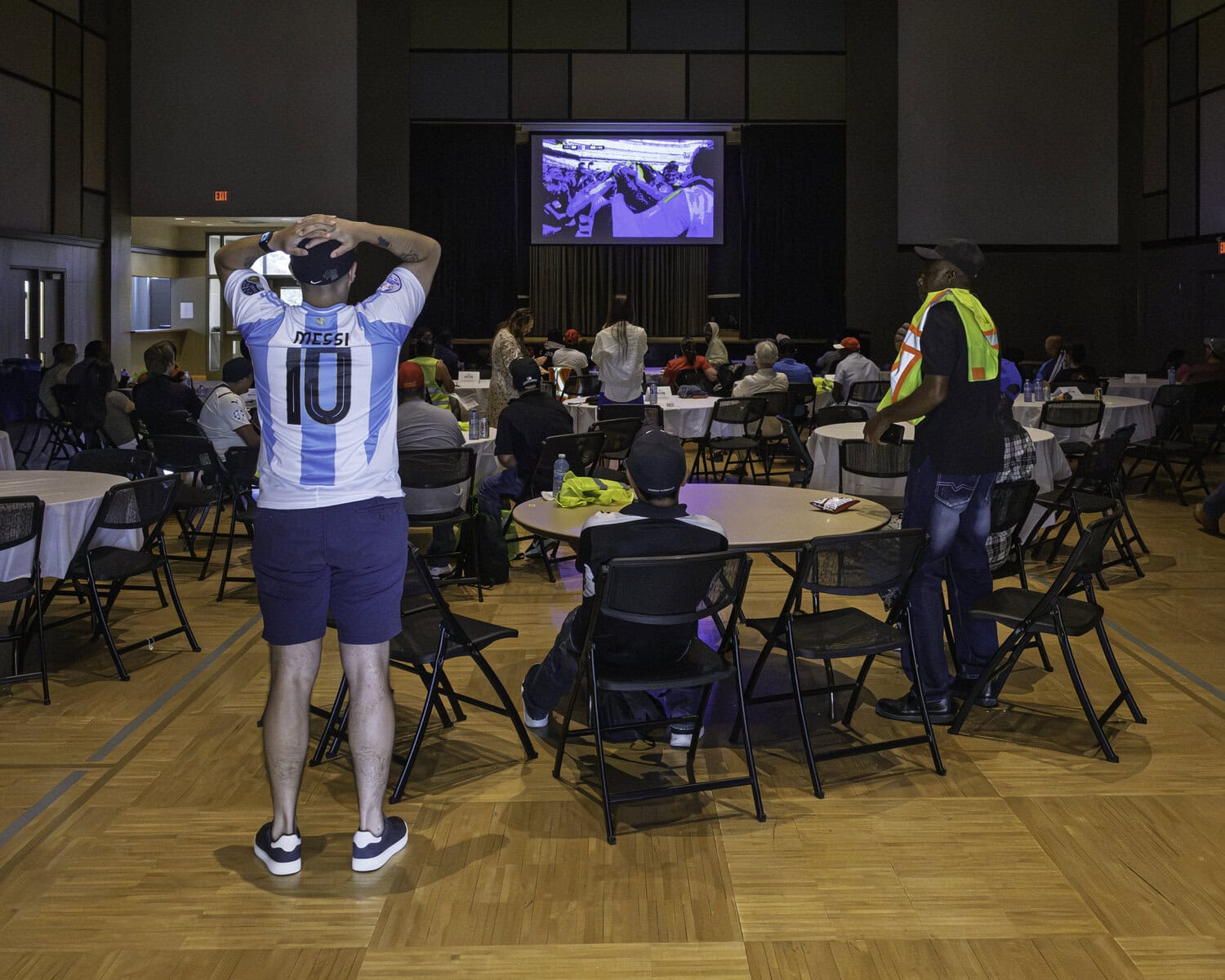 An Argentina fan watches dejectedly as Spain scores in the 106th minute to lead the game 1-0, which would end up being the final score.