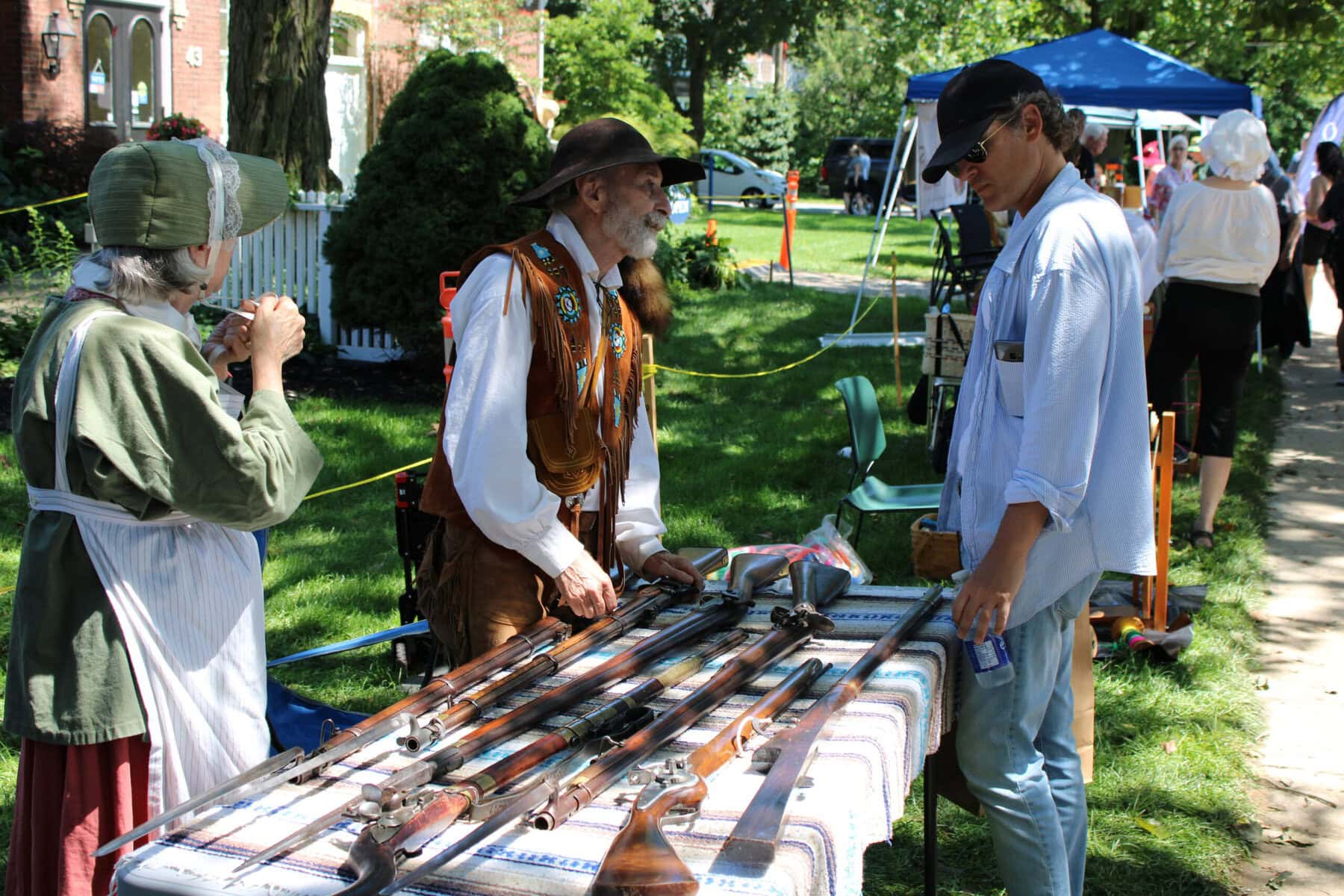 Historical re-enactors speak with visitors during the Niagara-on-the-Lake Museum’s annual Heritage Festival on Aug. 3.