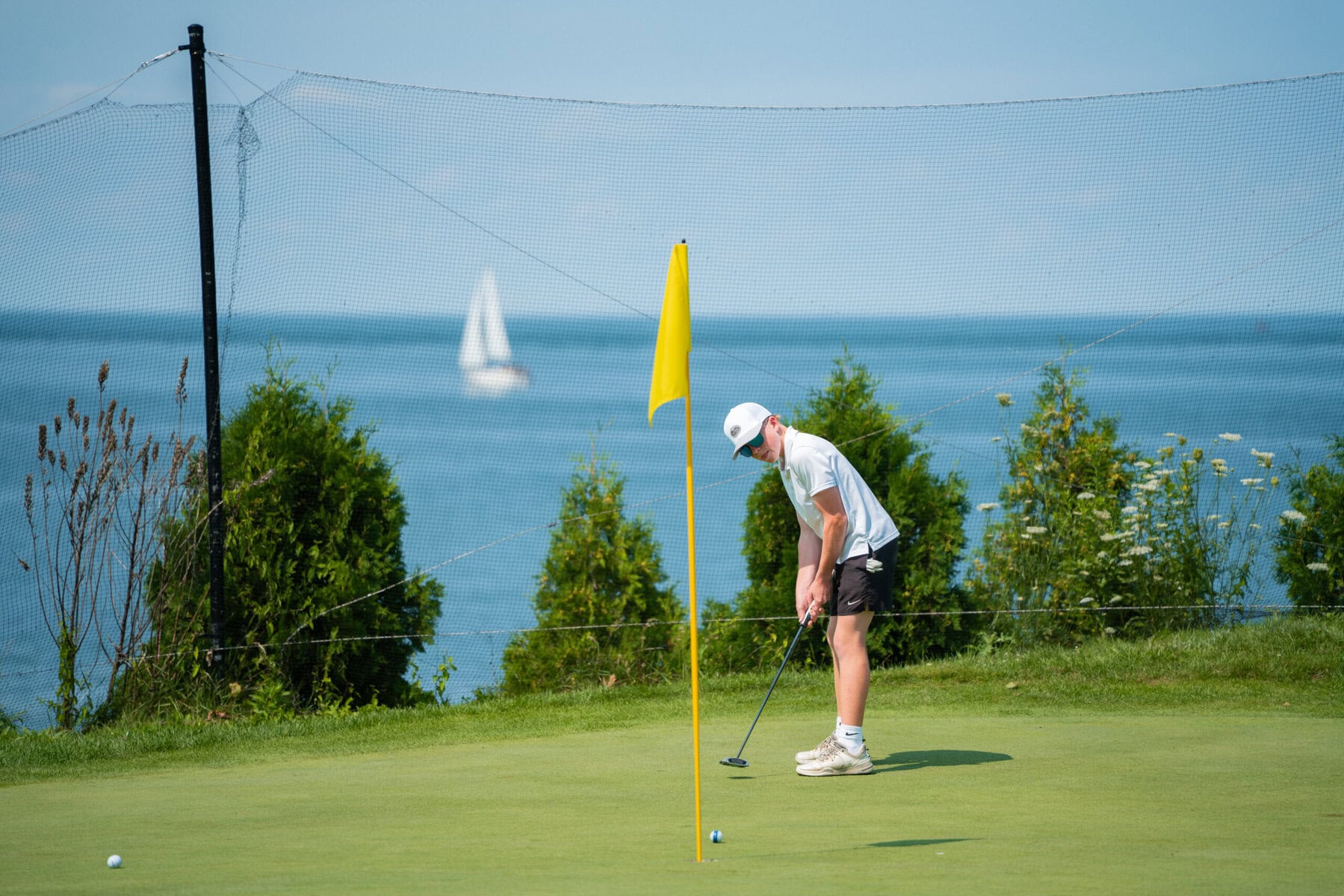 Jayden Polgrabia putts on the seventh green.