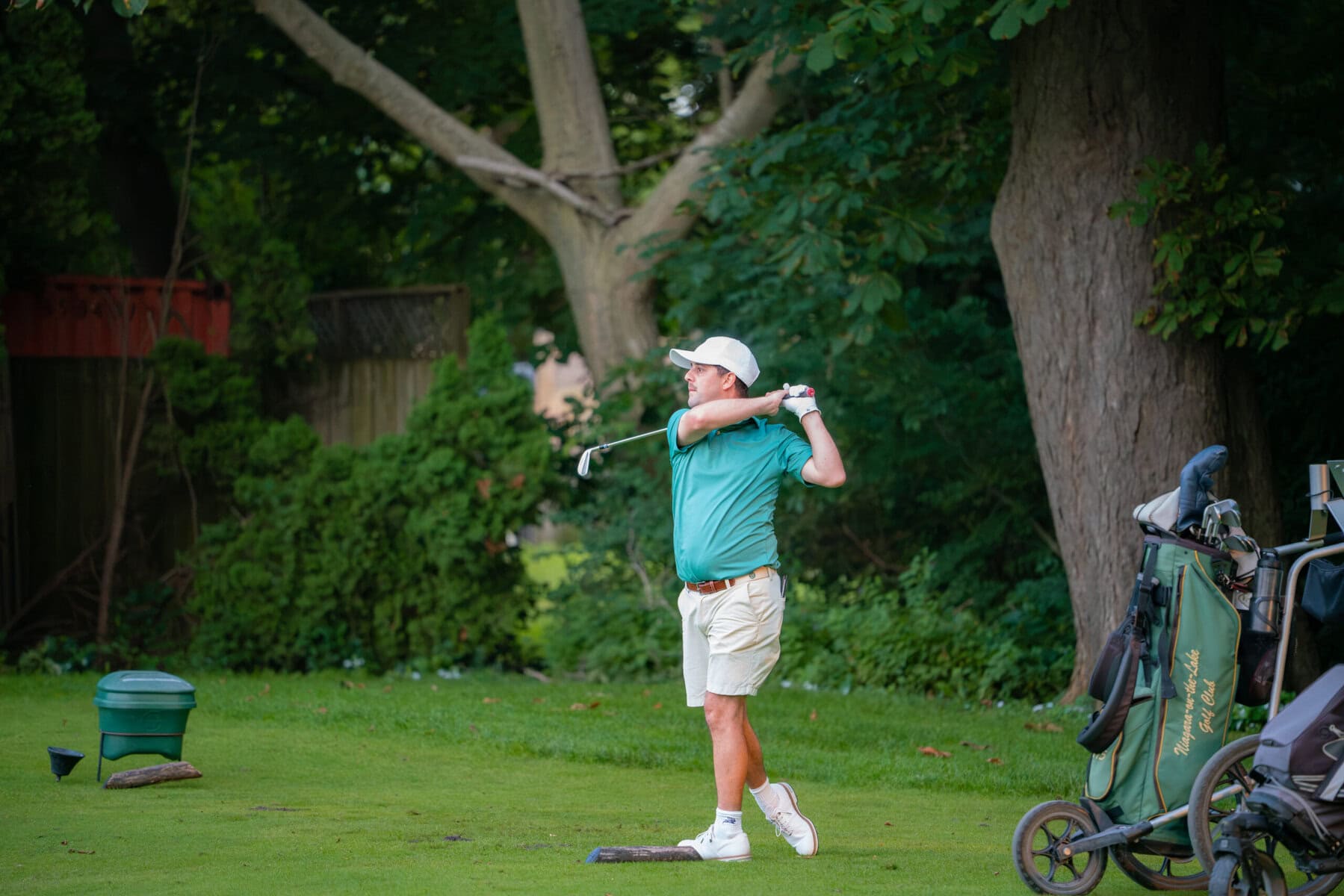 Men's Open champ Ricky Watson tees off on the 18th hole Sunday. He birdied the hole and won by four shots over his good friend, and last year's champ, James Grigjanis-Meusel.