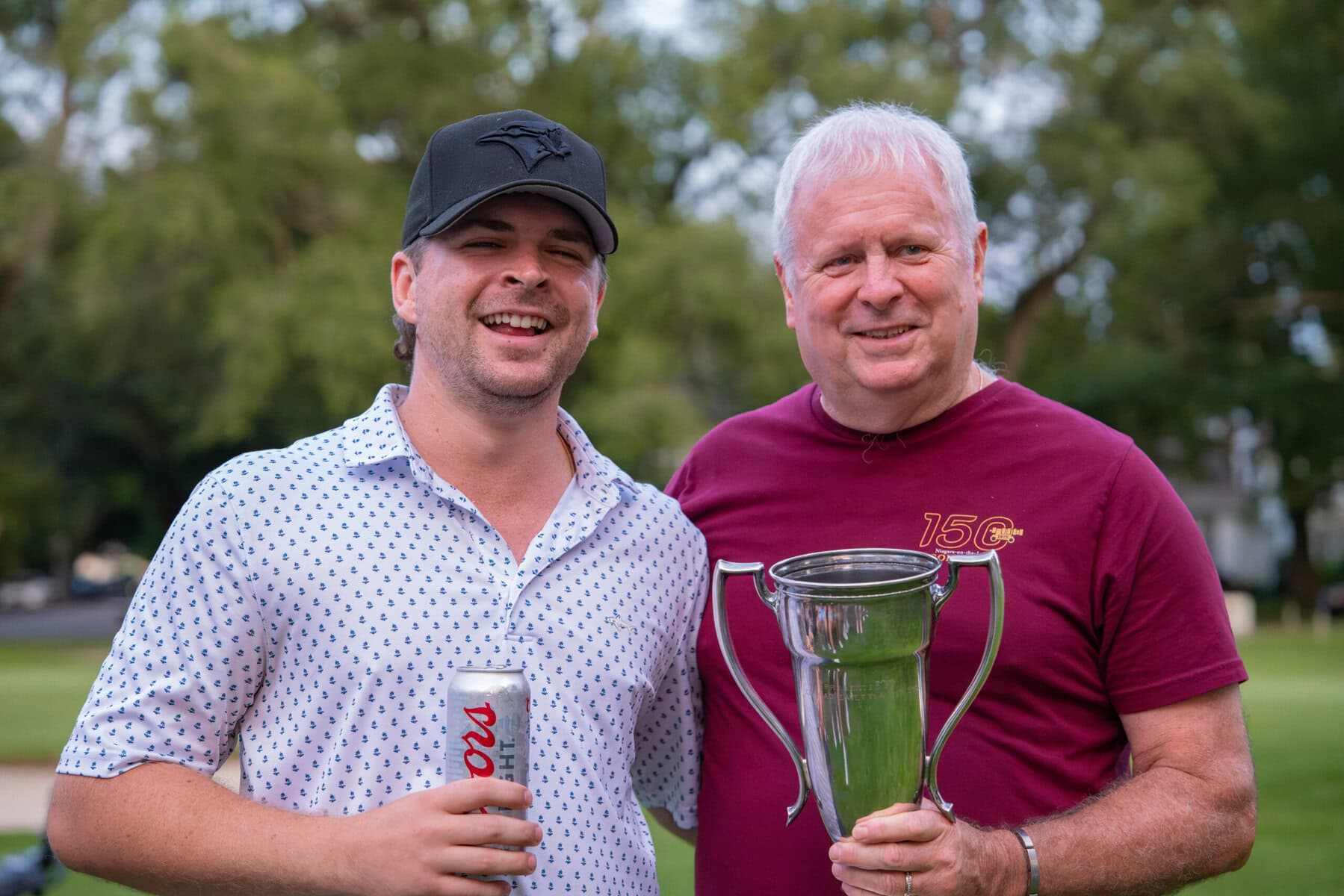 Men's D flight winner Colby Ostromecki with Mark Derbyshire.