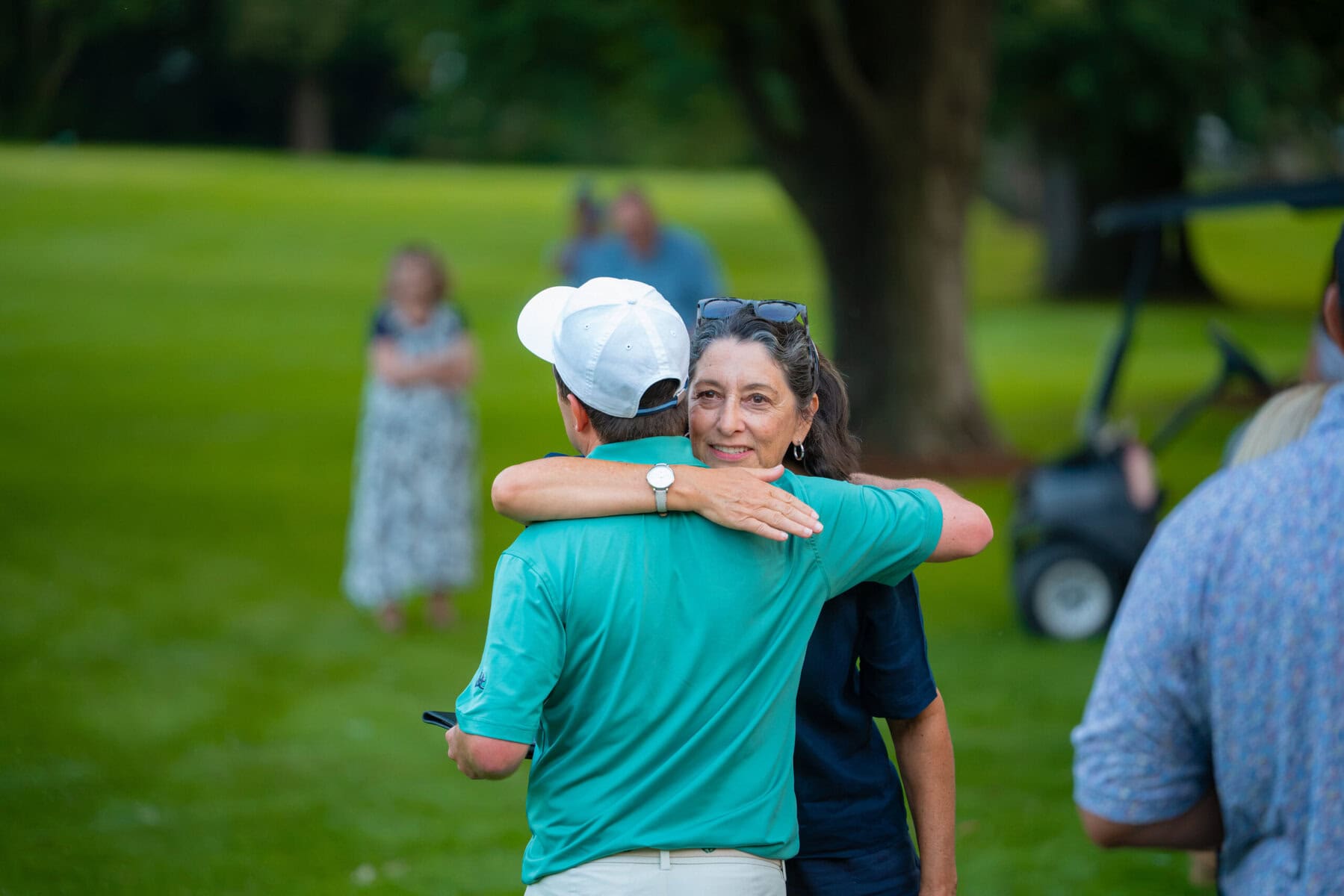Ricky Watson gets a hug from his mom Suzanne after winning his third men's Open championship.