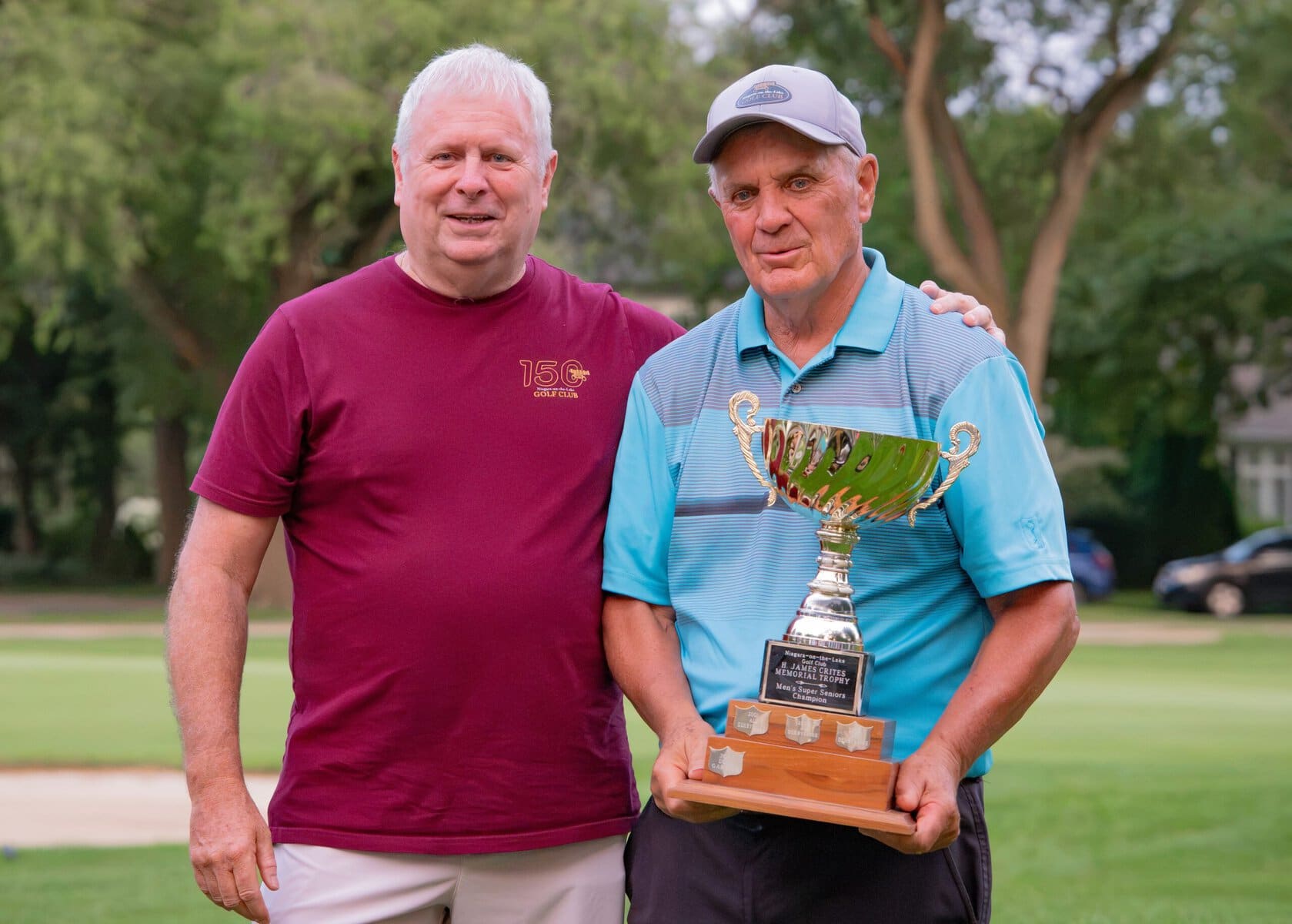 Super seniors champ Don Allen with Mark Derbyshire, left.