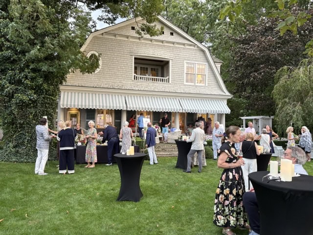 Guests gather at a private Chautauqua home for the sold-out Heritage Trail fundraiser, which drew 85 people.