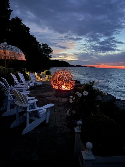 Guests enjoyed a lakeside sunset in Chautauqua during the Sept. 3 Heritage Trail garden party, which raised close to $20,000.