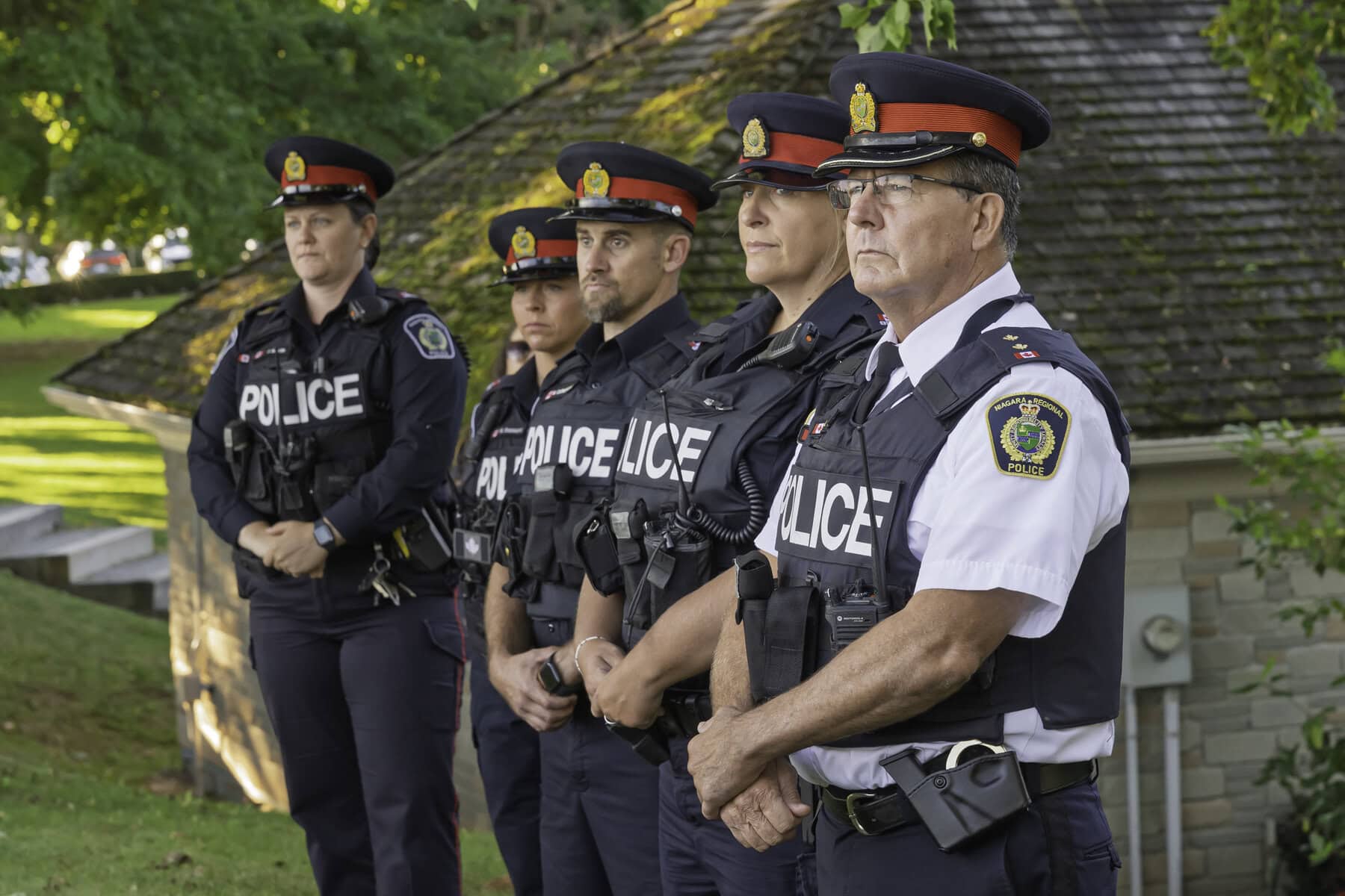 Niagara Regional Police officers listen as officials speak about the effects of the 9/11 attacks on first responders in the United States.