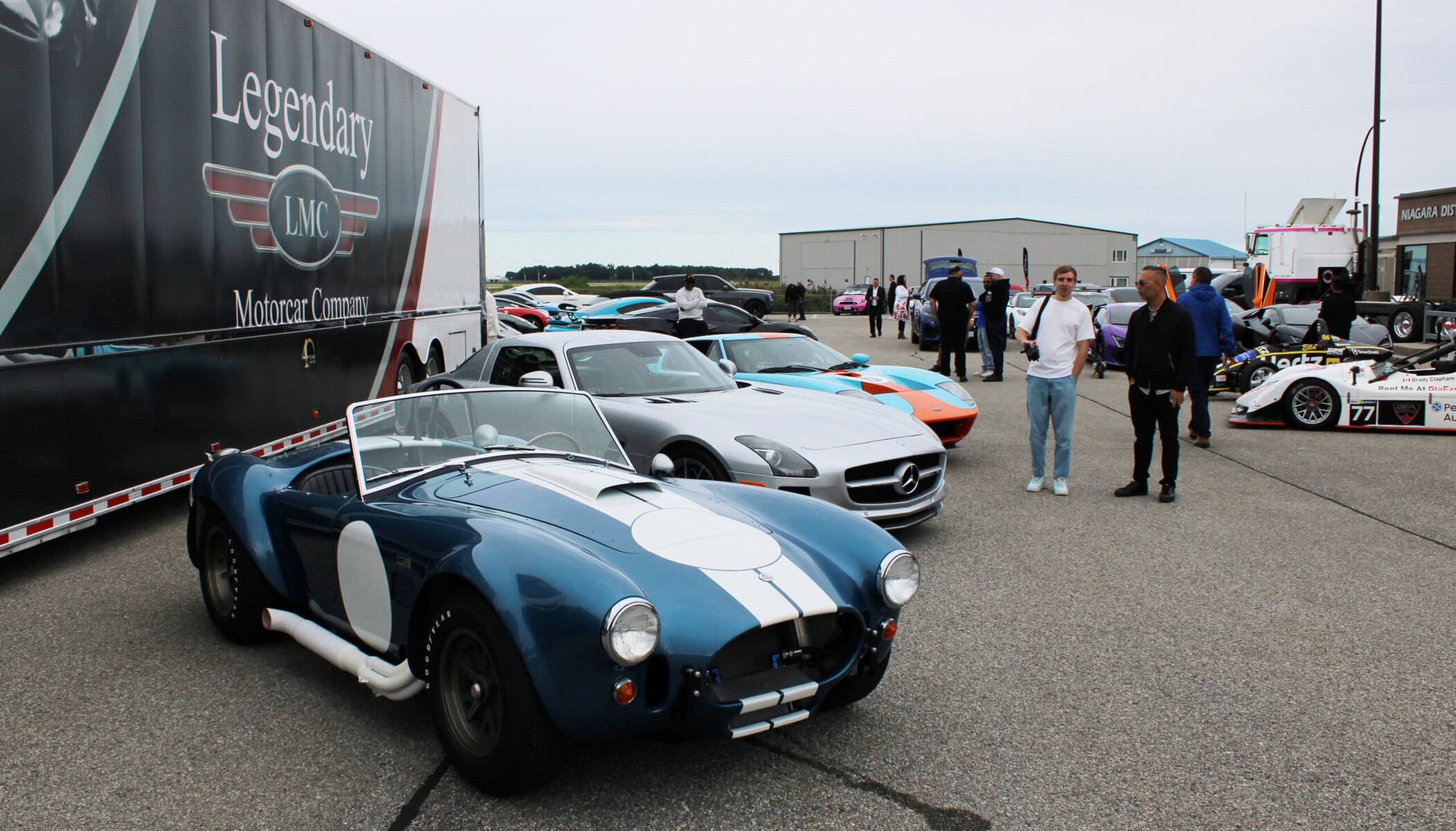 A blue Shelby Cobra leads a row that includes a Mercedes SLS AMG and a Gulf-liveried Ford GT, trucked in by Legendary Motorcar Company of Halton Hills for Saturday's show.
