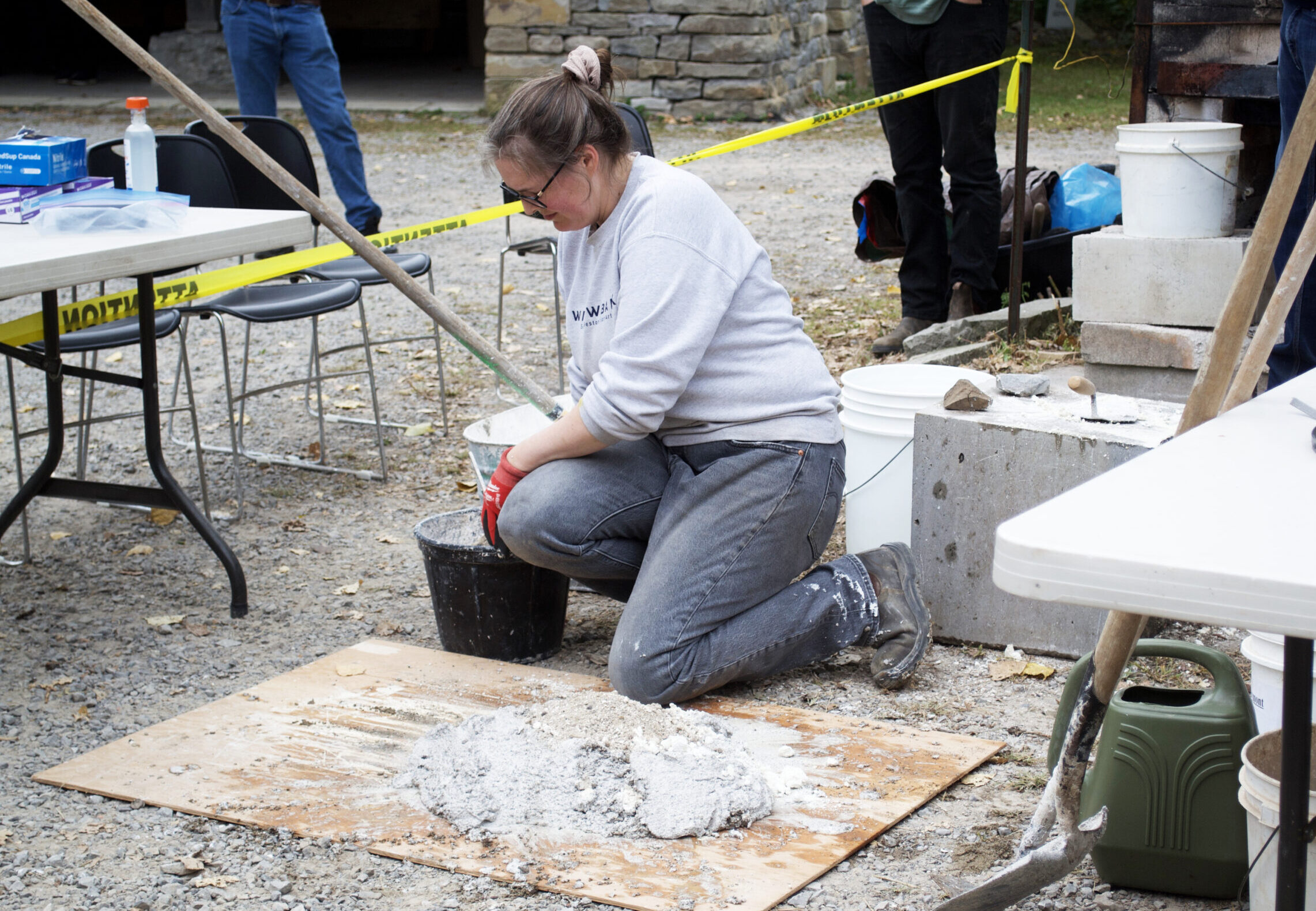 Alex Blades demonstrates traditional lime mortar making.