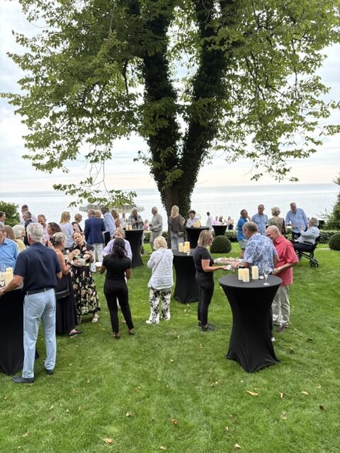 A sold-out crowd enjoys the lakeside garden party in Chautauqua, where nearly $20,000 was raised for the Heritage Trail.