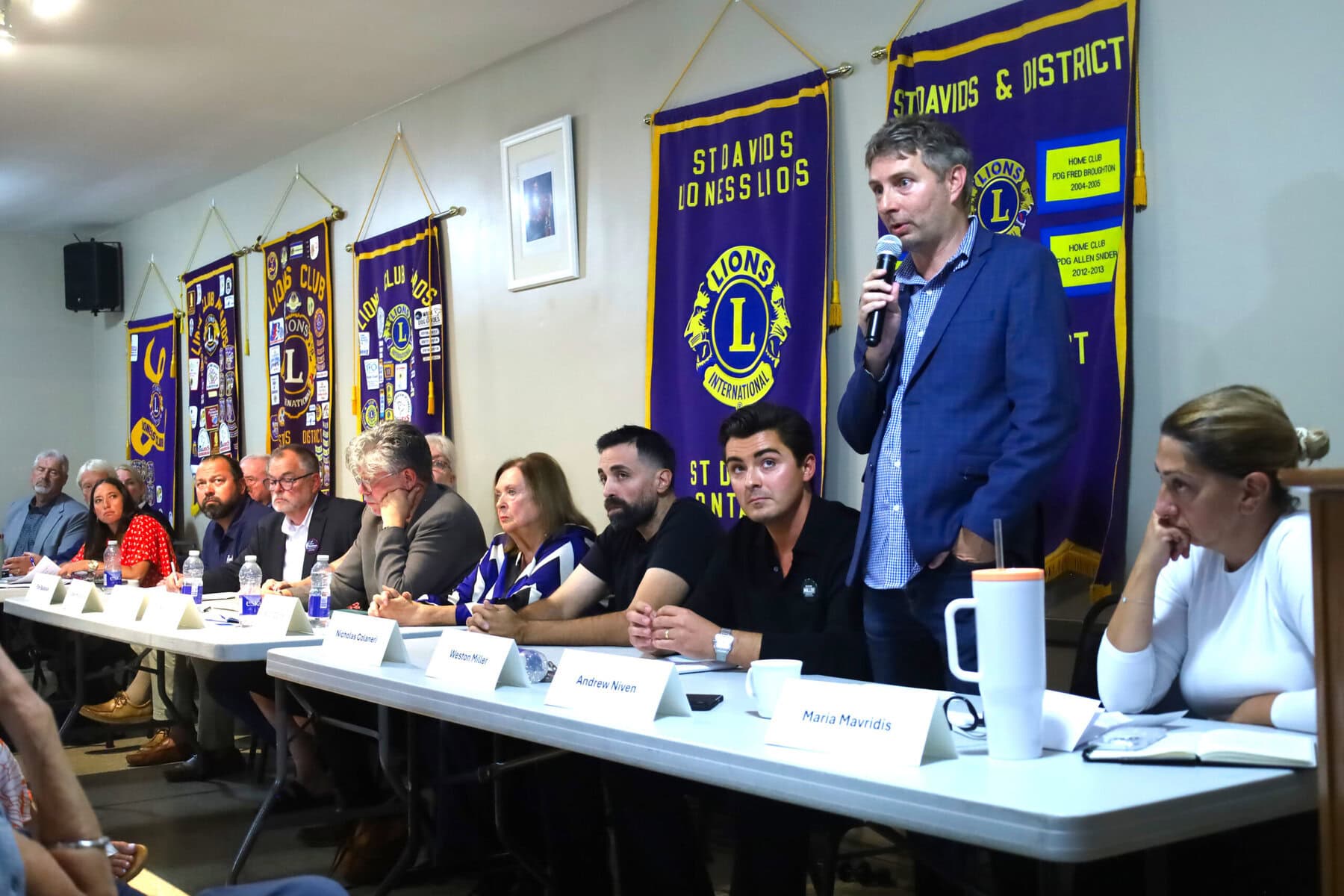 Coun. Andrew Niven tells the crowd at Wednesday’s debate that he and the town’s chief administrative officer, Nick Ruller, recently sat down with Reginald Huggins inside his Millpond Road home — the same home hit repeatedly by sewage backups.